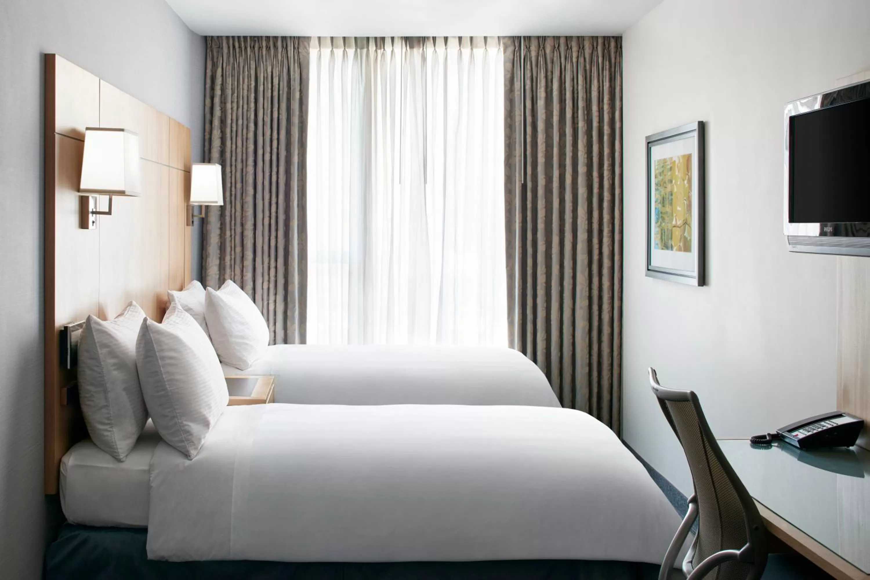 Bed in Club Quarters Hotel World Trade Center, New York