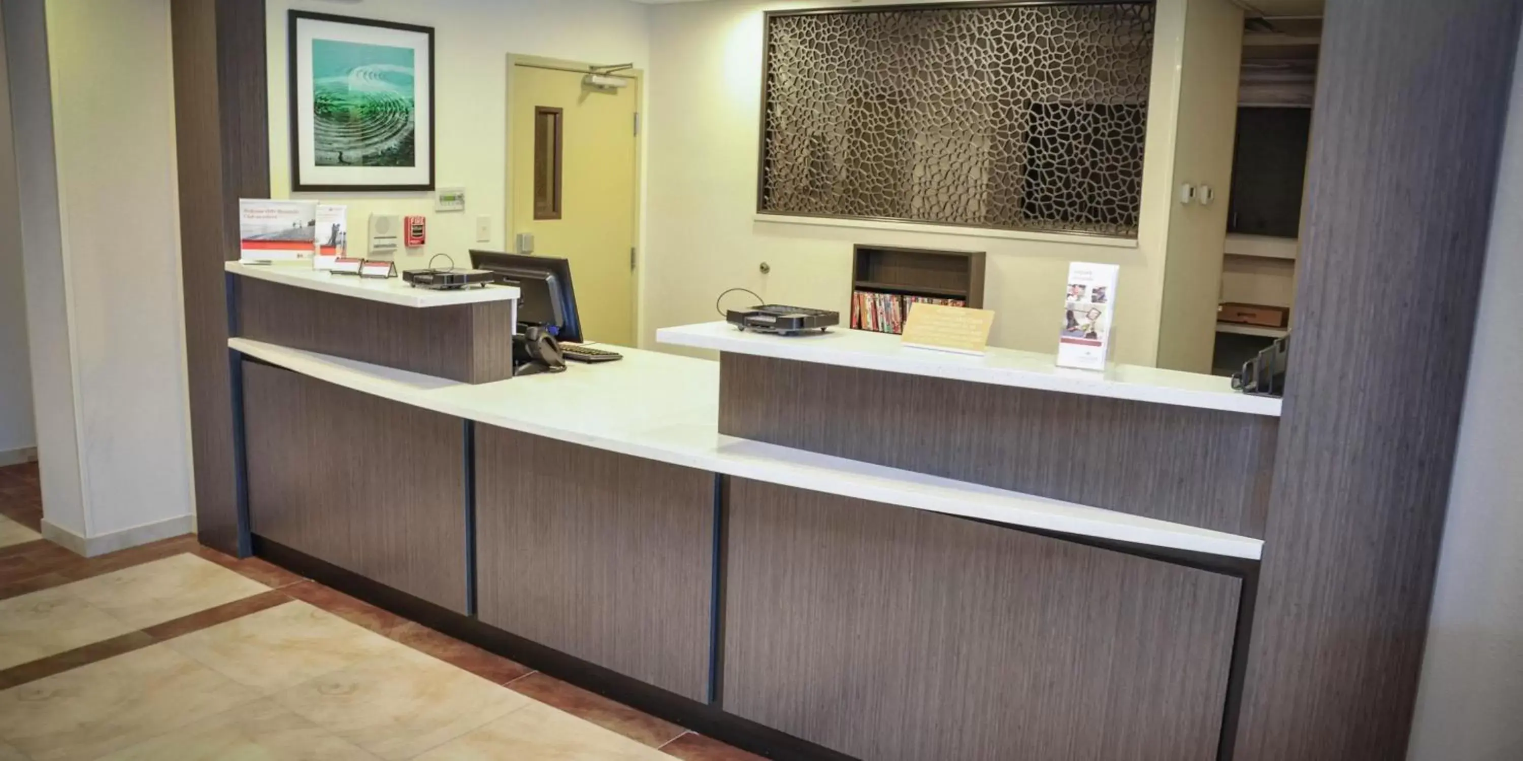 Property building, Lobby/Reception in Candlewood Suites Pearl, an IHG Hotel