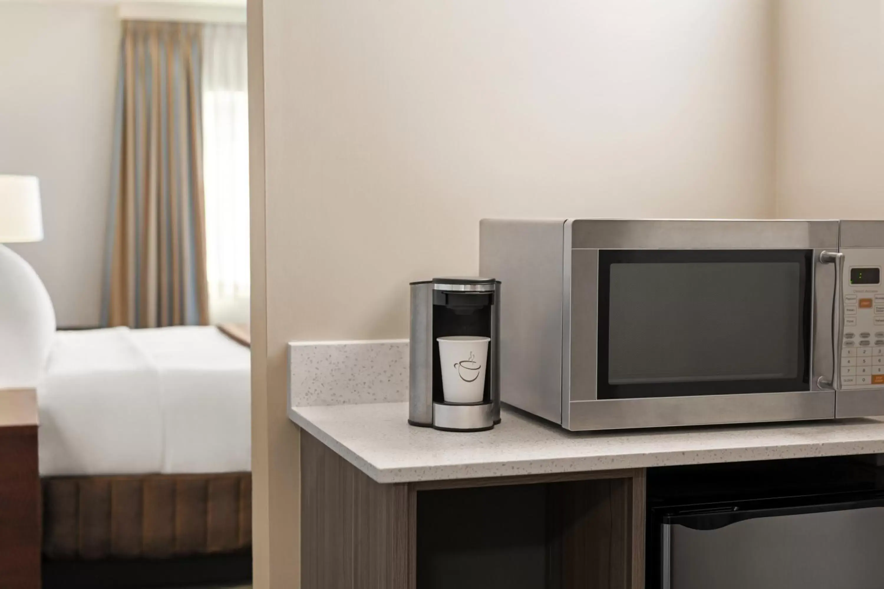 TV/Entertainment Center in Travelodge by Wyndham Calgary South