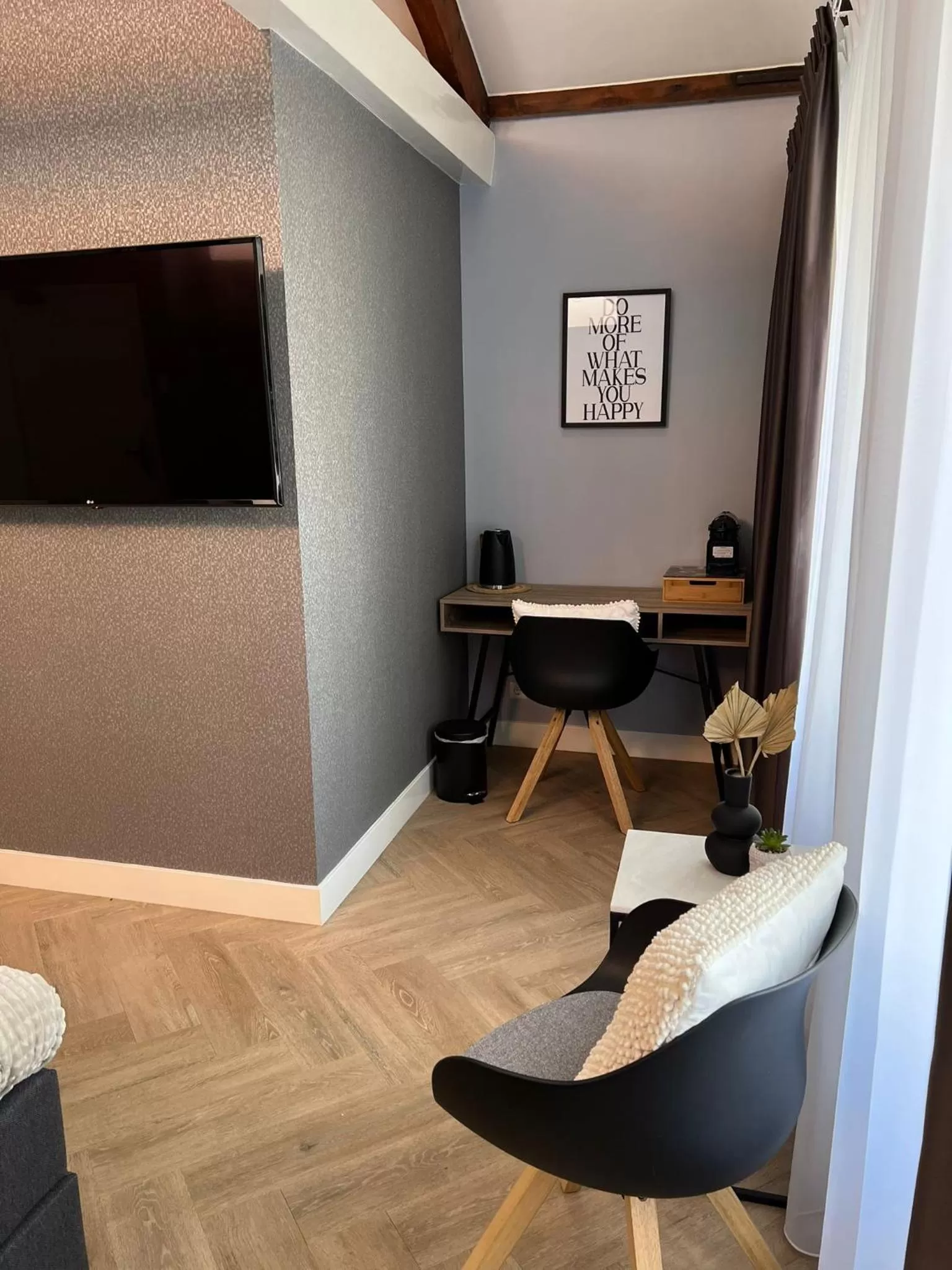 TV and multimedia, TV/Entertainment Center in Boutique Hotel Ravioli Brothers