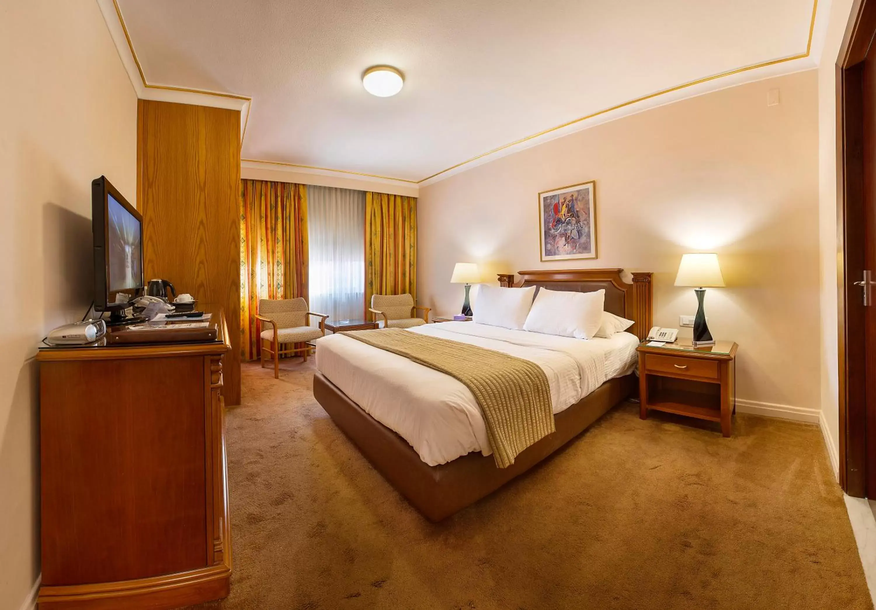 Photo of the whole room, Bed in Amman International Hotel