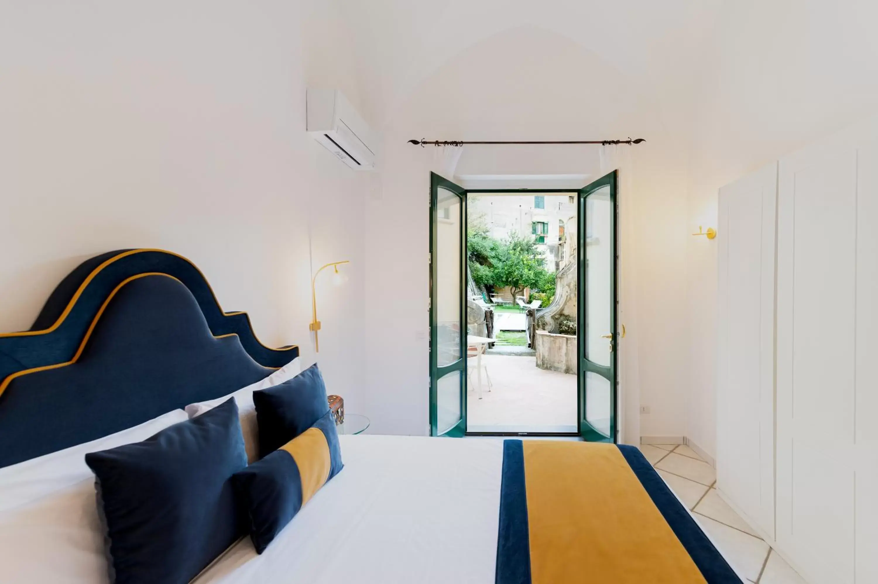 Patio, Bed in Amalfi Resort