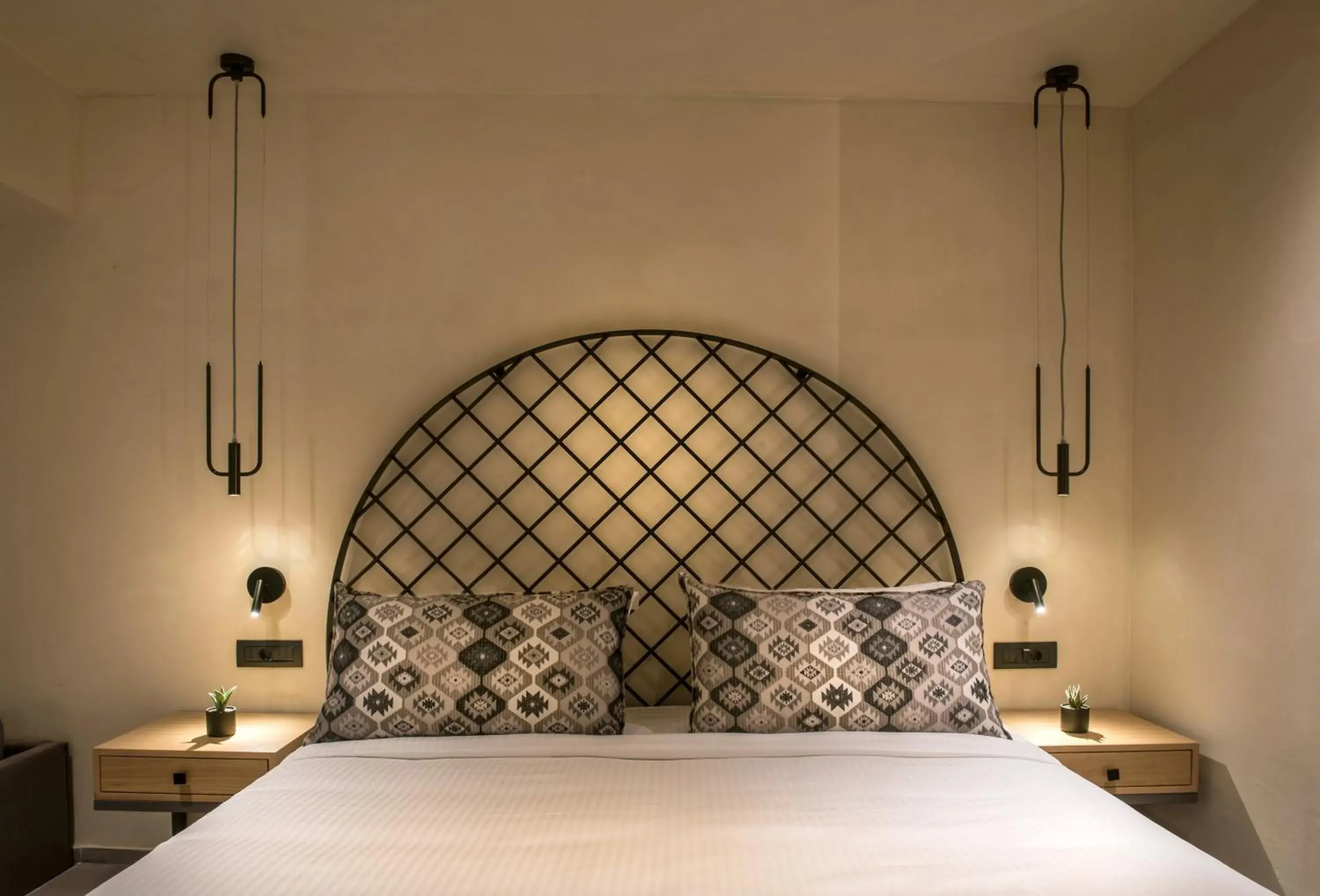Bed in Petousis Hotel & Suites