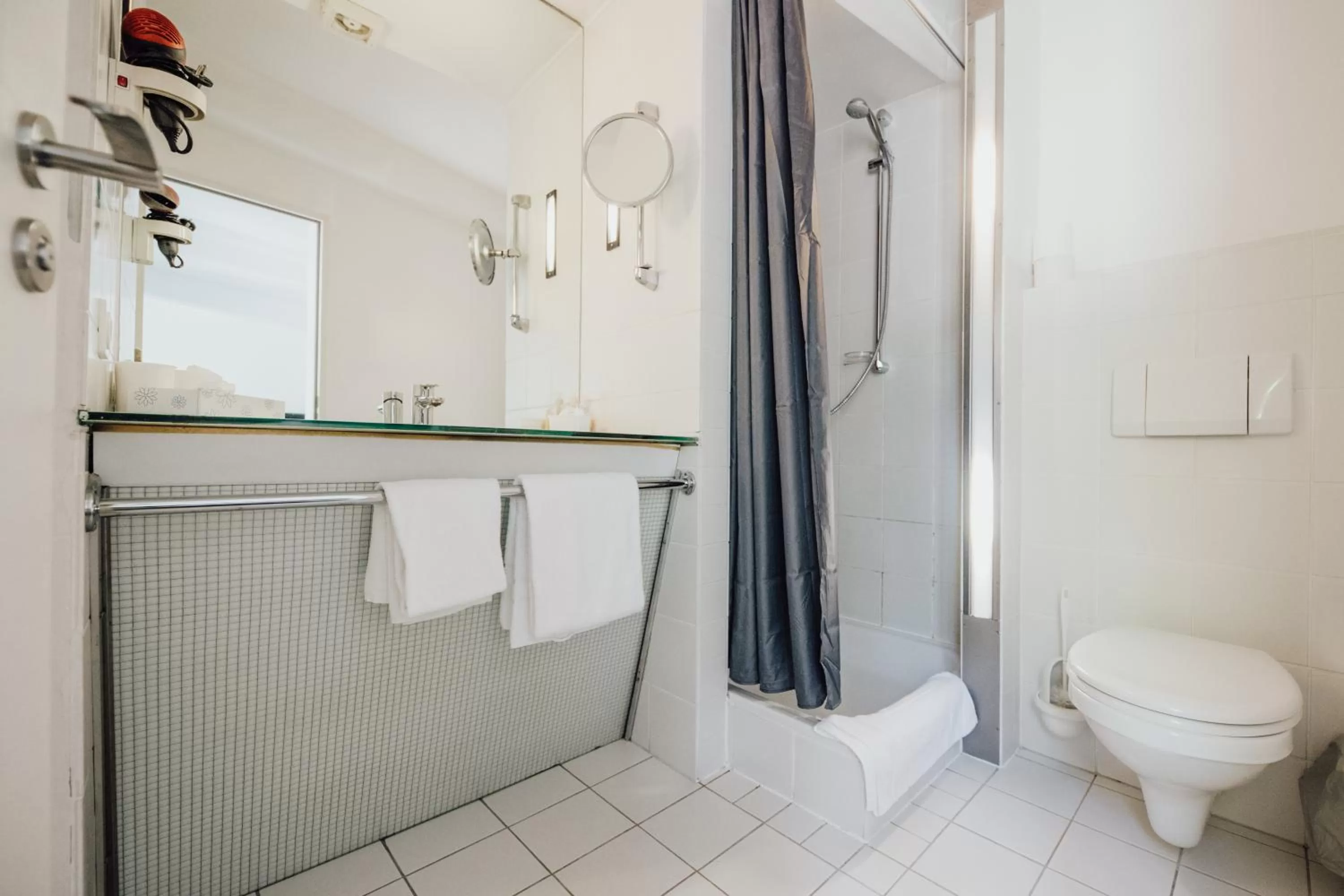 Toilet in Magni Boutique Hotel