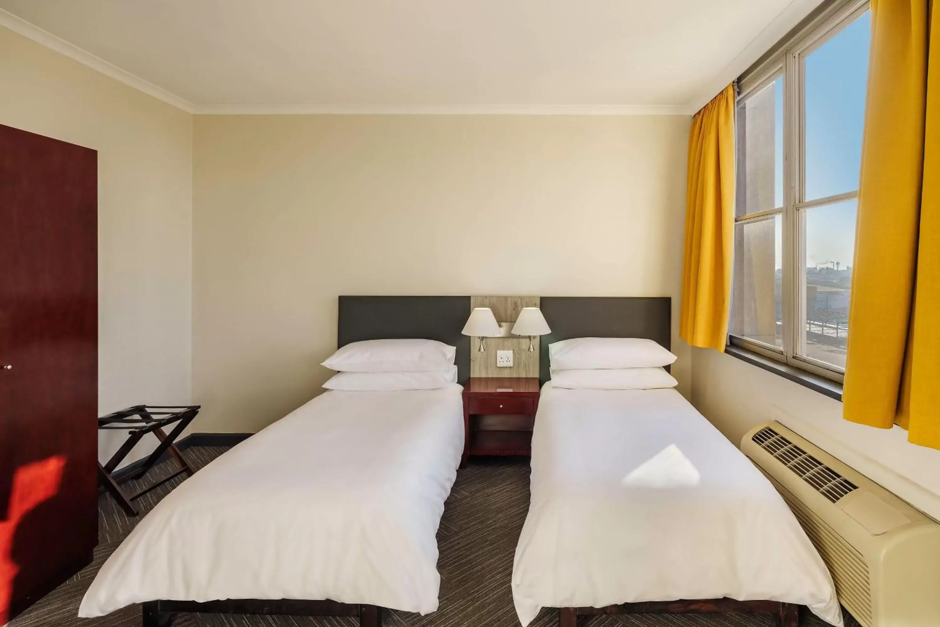 Photo of the whole room, Bed in Protea Hotel by Marriott Lusaka Cairo Road