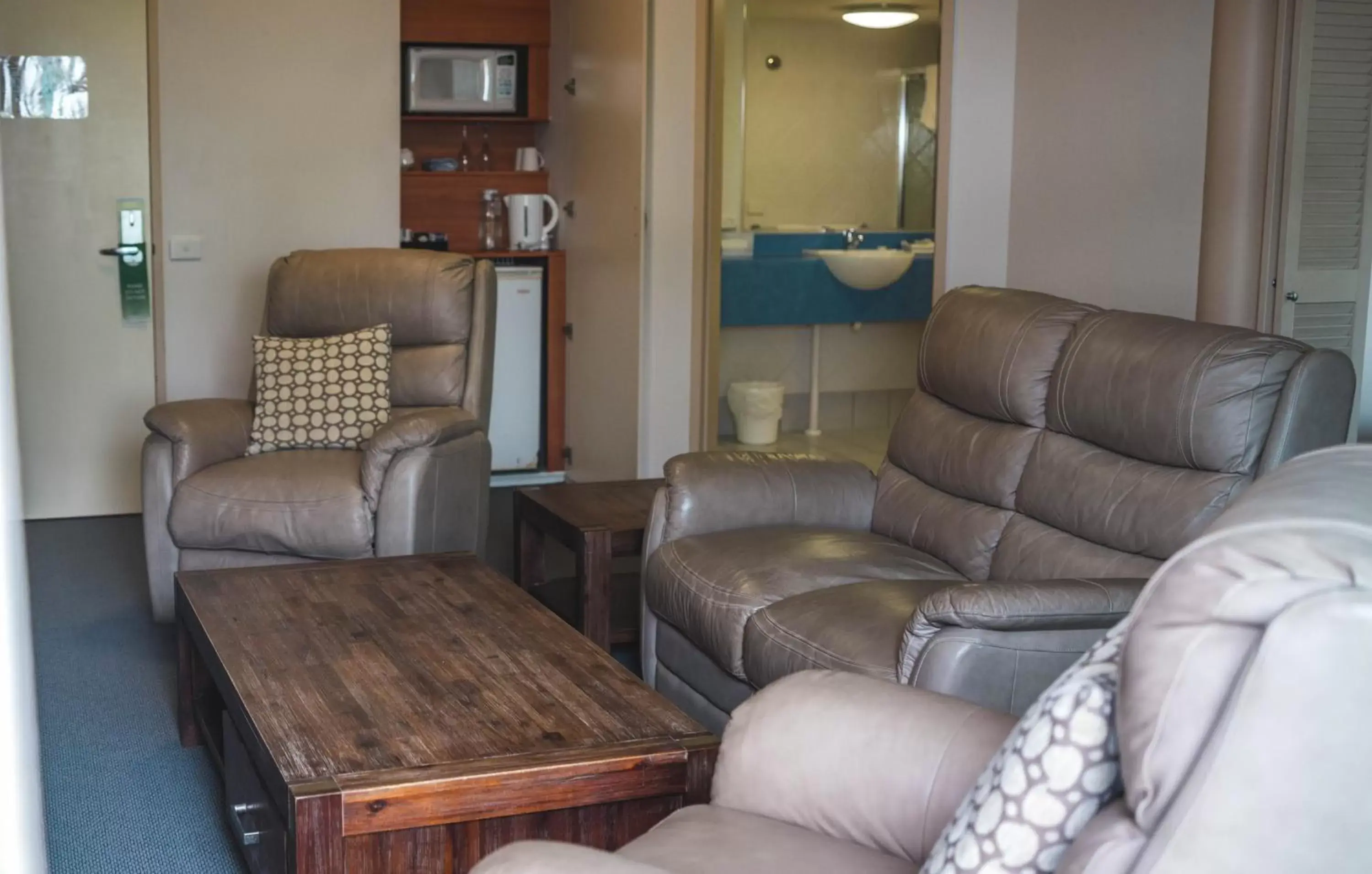 TV and multimedia, Seating Area in Heritage Cairns Hotel