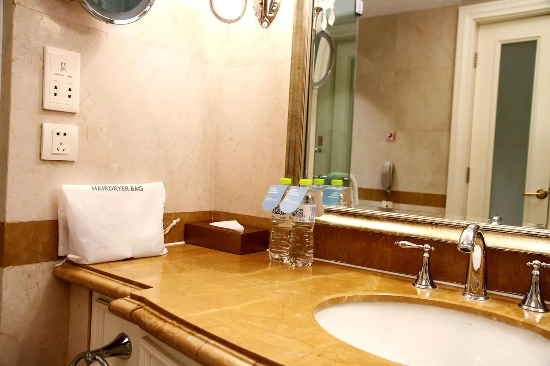 Toilet in Crowne Plaza Ocean Spring Resort by IHG