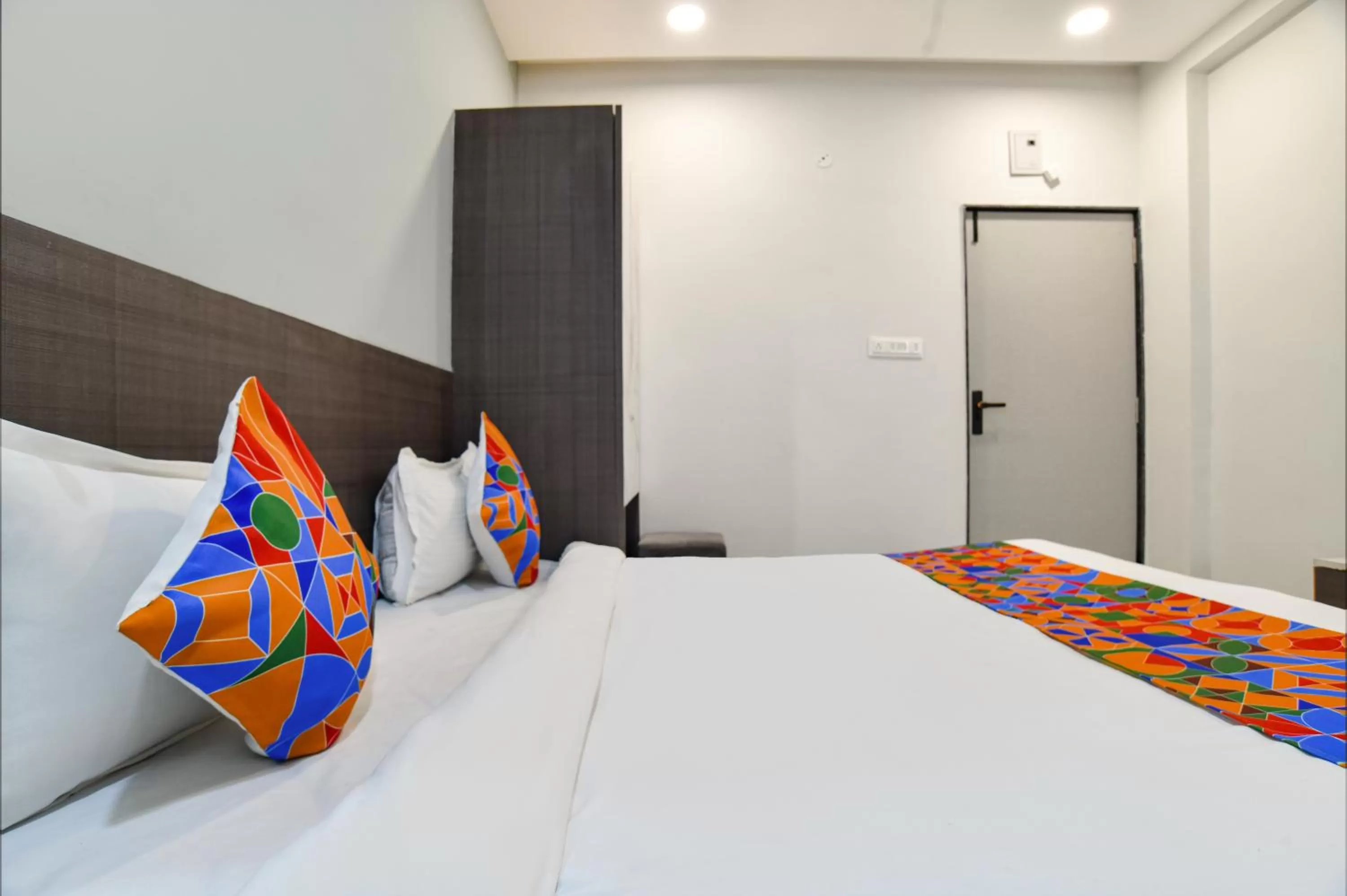 Photo of the whole room, Bed in Fabhotel Grand Blue