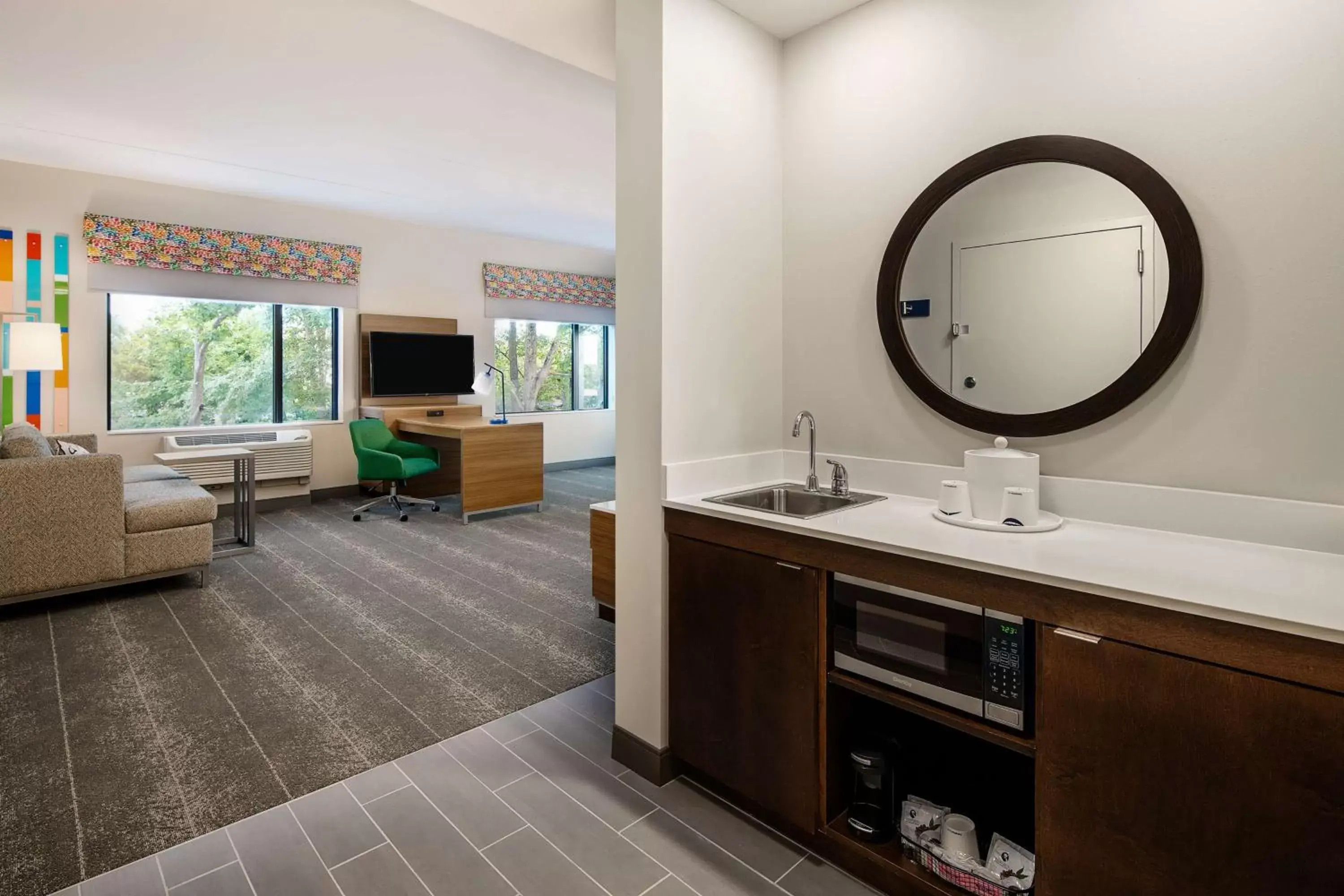 Living room, Bathroom in Hampton Inn & Suites Raleigh Midtown, NC