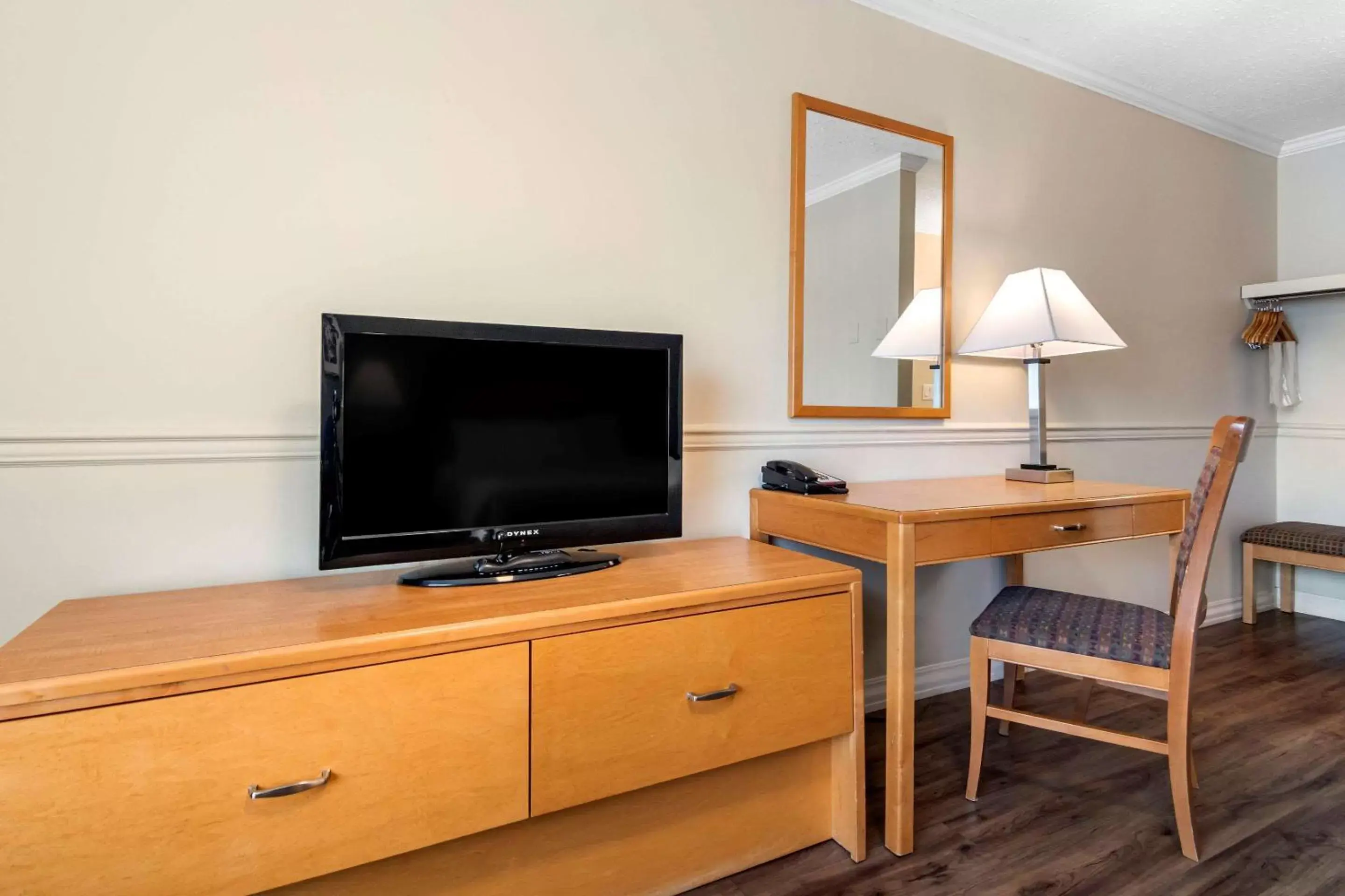 Photo of the whole room, TV/Entertainment Center in Econo Lodge Inn & Suites