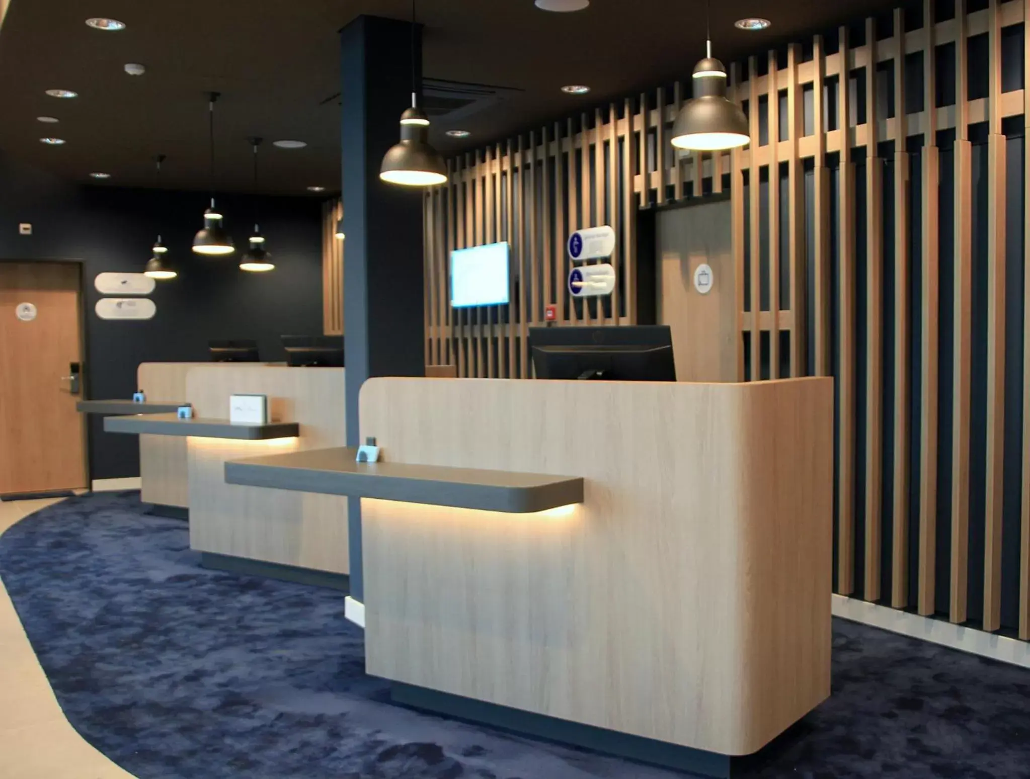 Property building, Lobby/Reception in Holiday Inn Express & Suites - Basel - Allschwil, an IHG Hotel