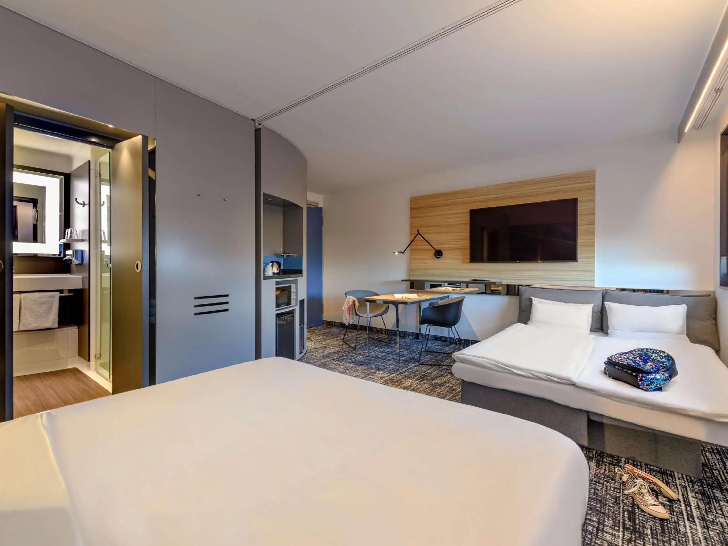 Photo of the whole room, Bed in Novotel Suites Berlin City Potsdamer Platz