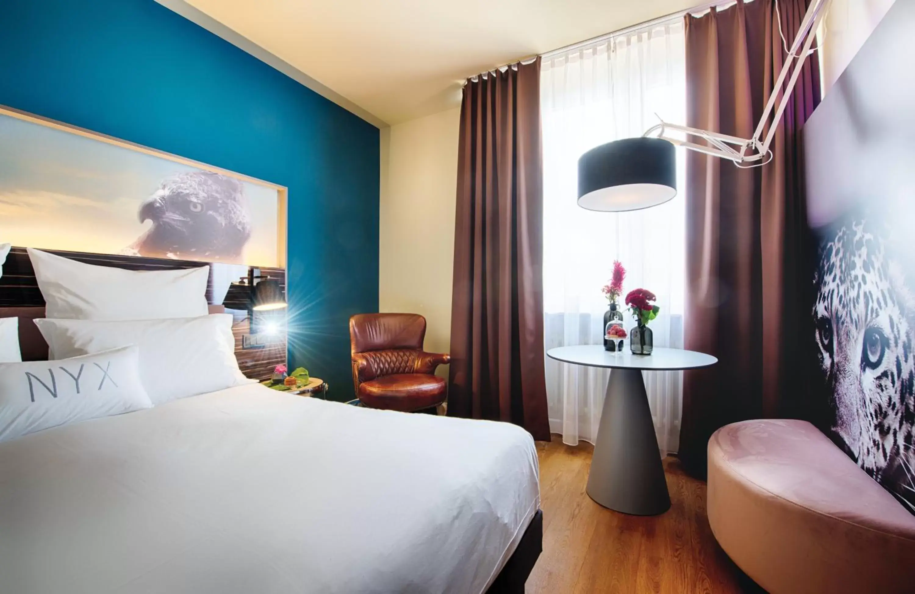 Photo of the whole room, Bed in NYX Hotel Mannheim by Leonardo Hotels