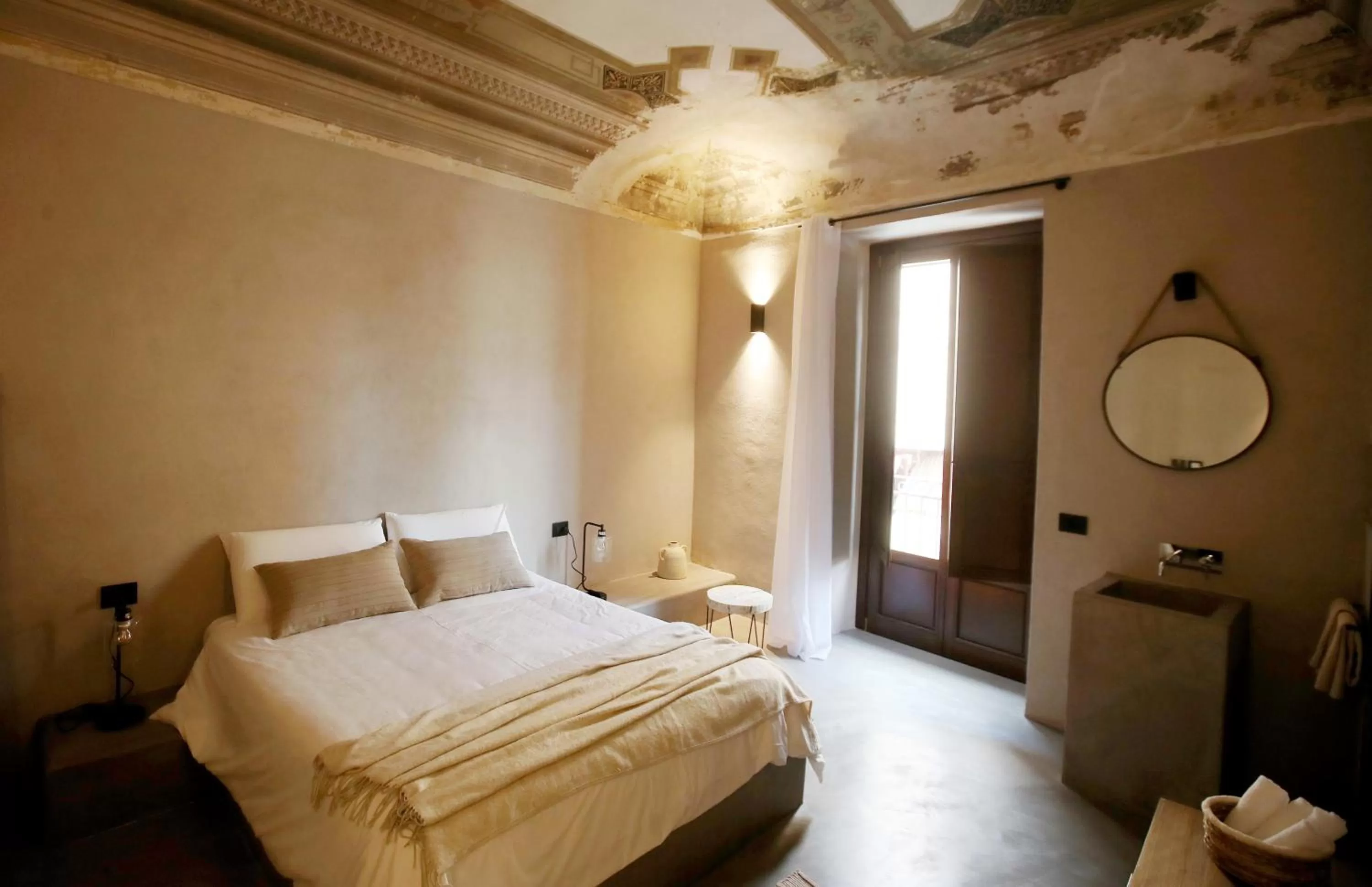 Bed in Casa Nostra Luxury Suites & Spa