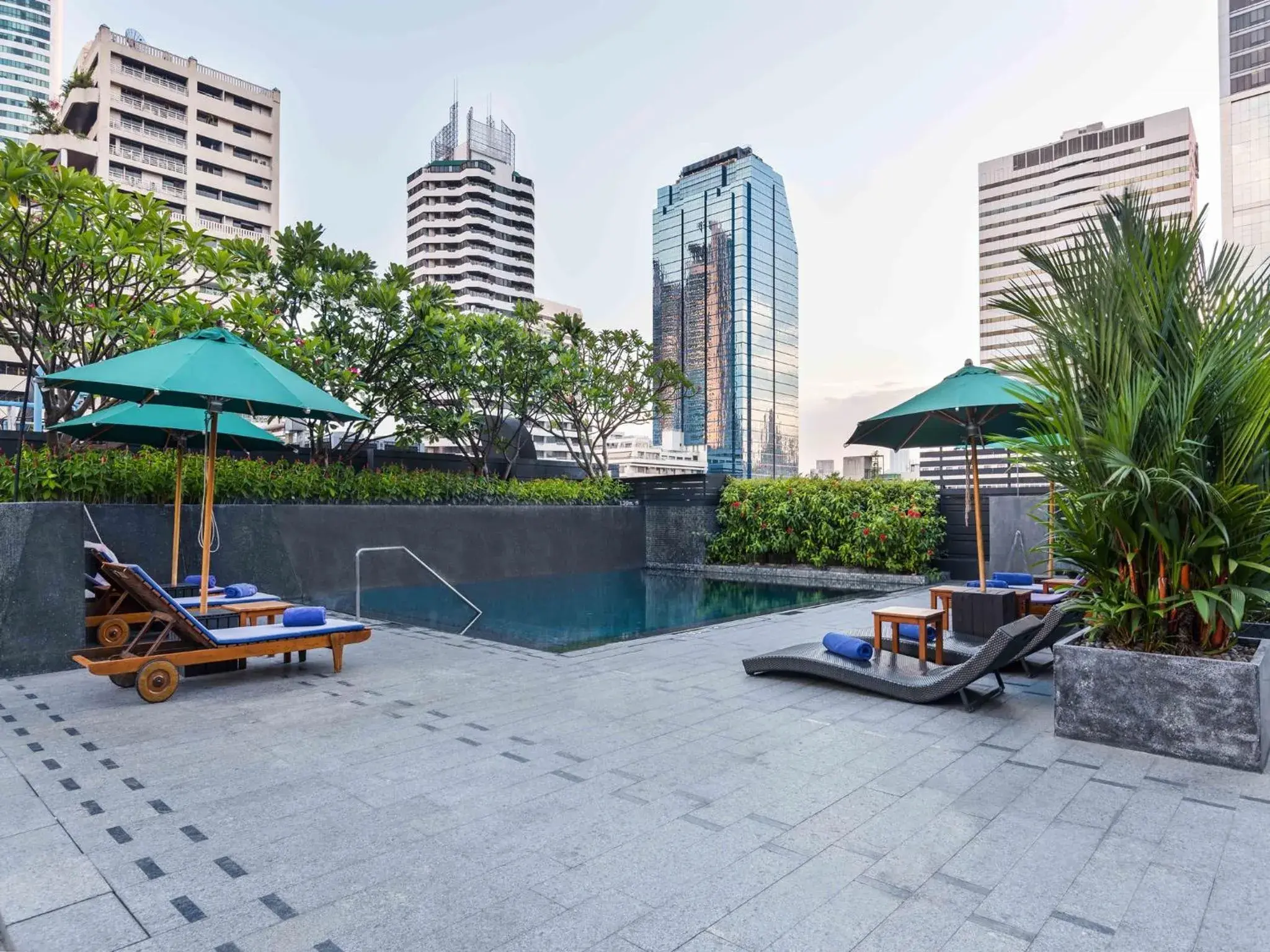 Swimming pool in Maitria Hotel Sukhumvit 18 Bangkok – A Chatrium Collection