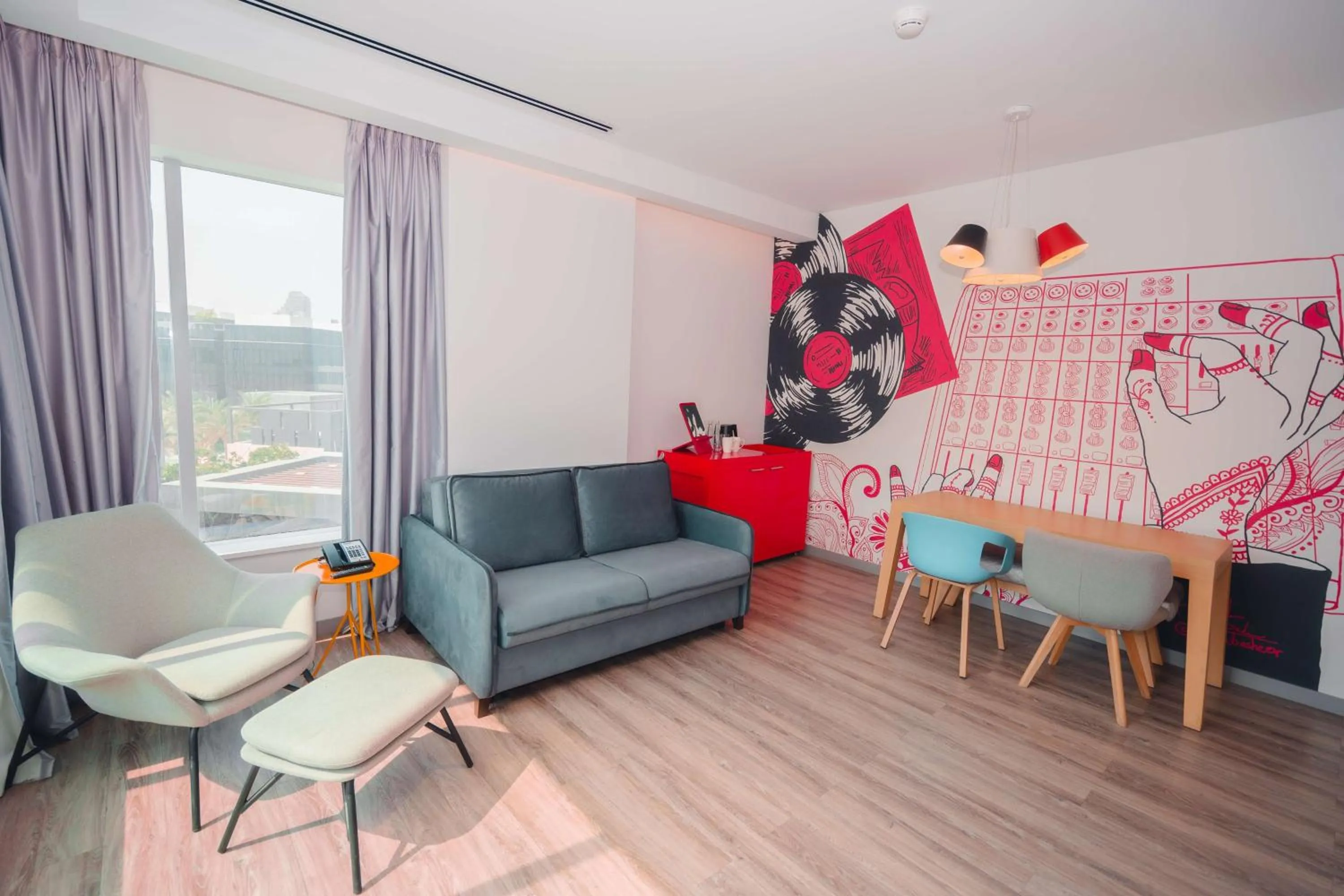 Photo of the whole room in Radisson RED Dubai Silicon Oasis