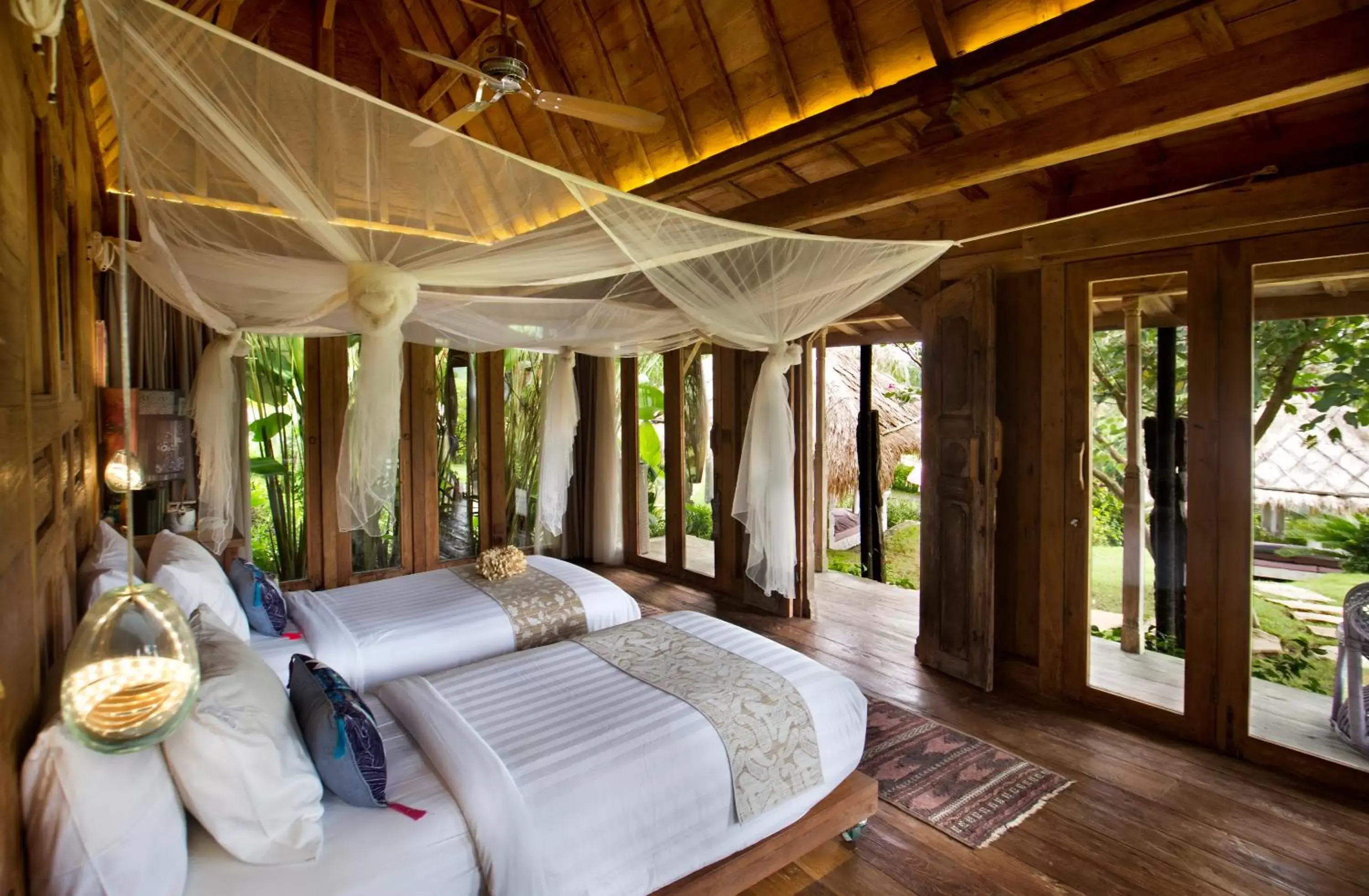 Bed in Blue Karma Dijiwa Ubud