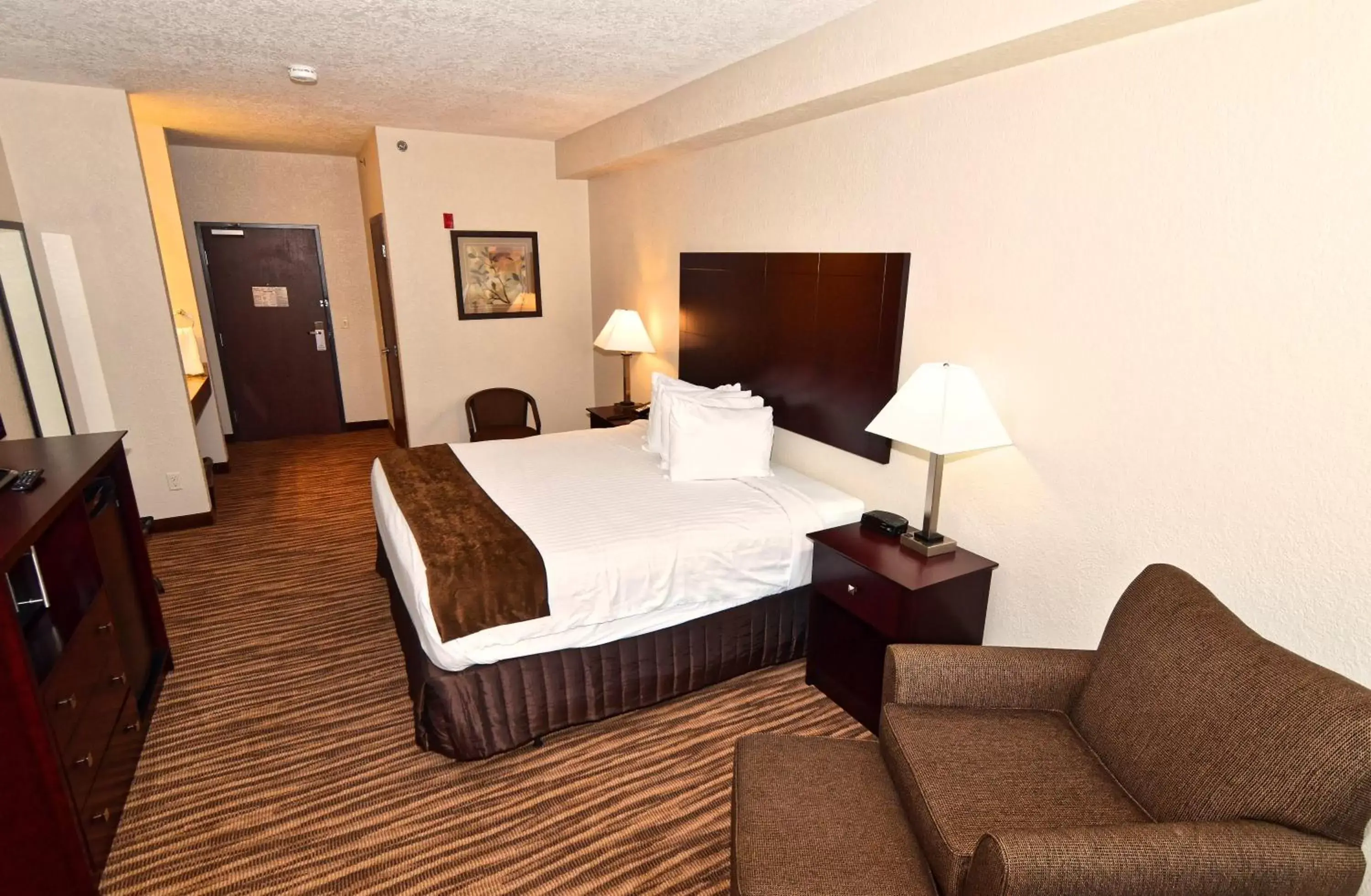 Bed in Cobblestone Inn & Suites - Clarion