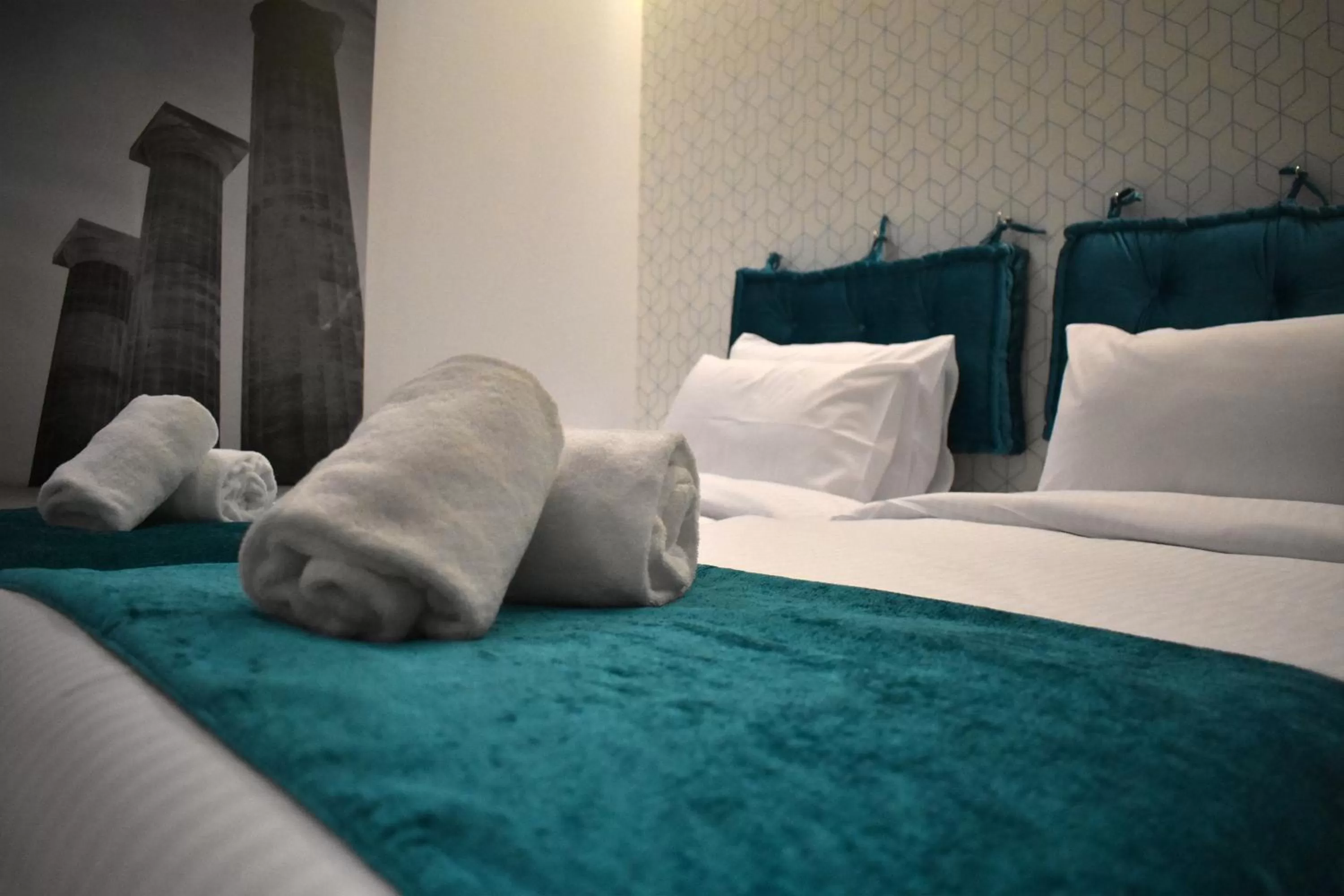 Bed in Athenian Montaza Hotel