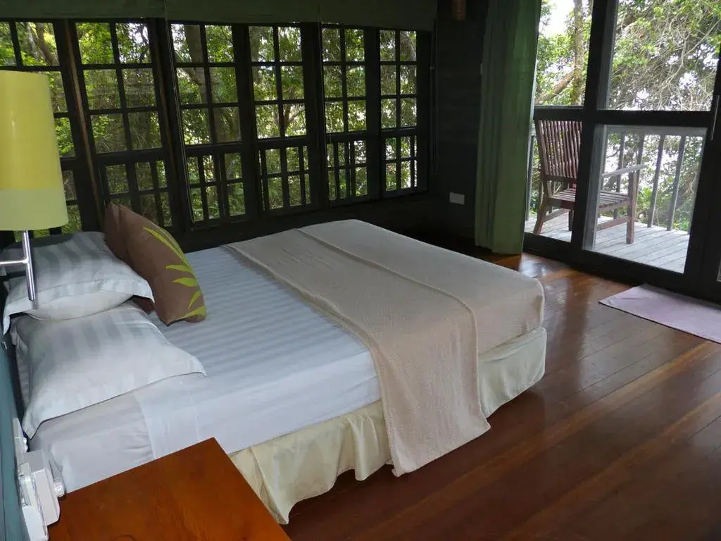 Bed in Permai Rainforest Resort