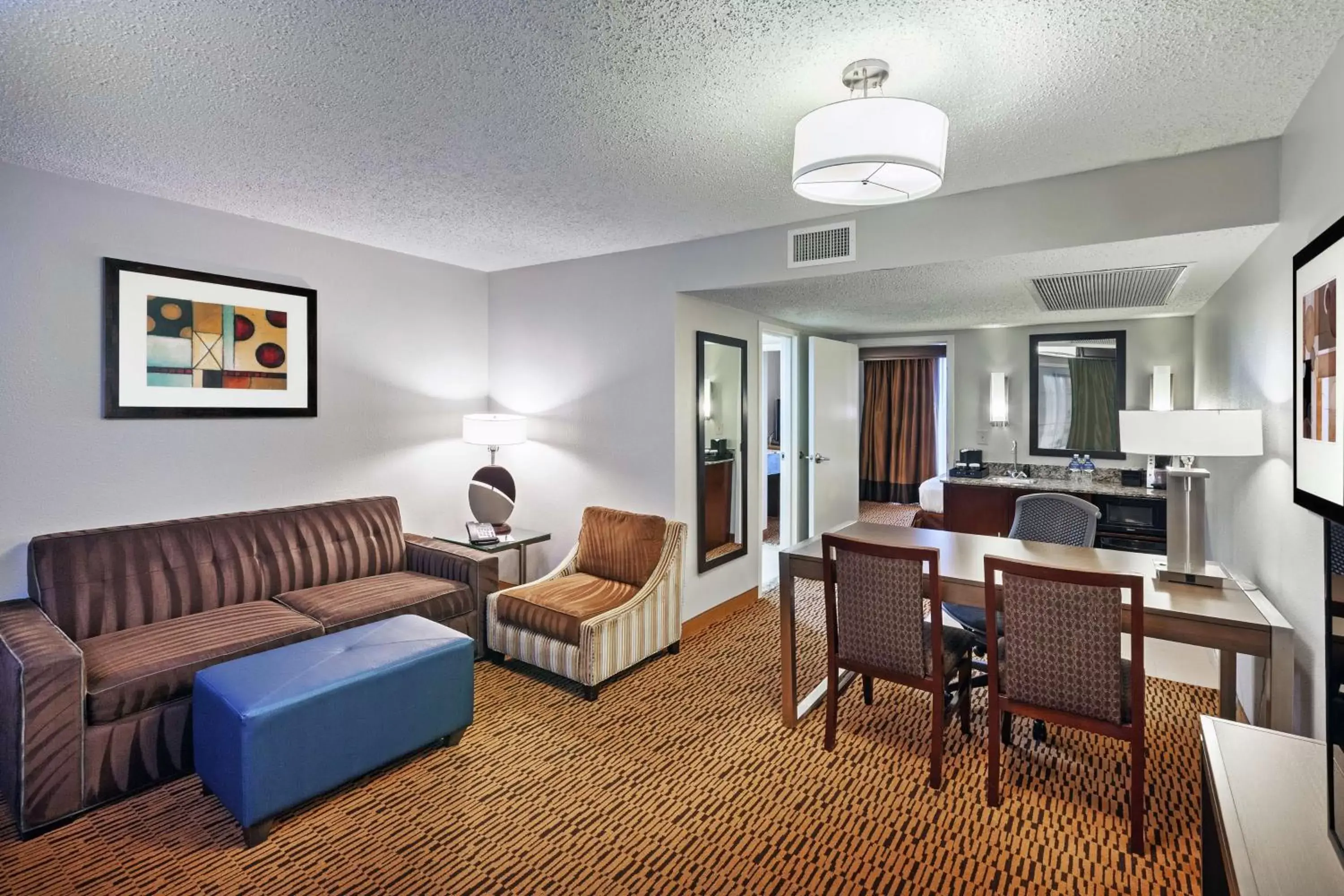 Living room, Seating Area in Embassy Suites by Hilton Dallas Market Center