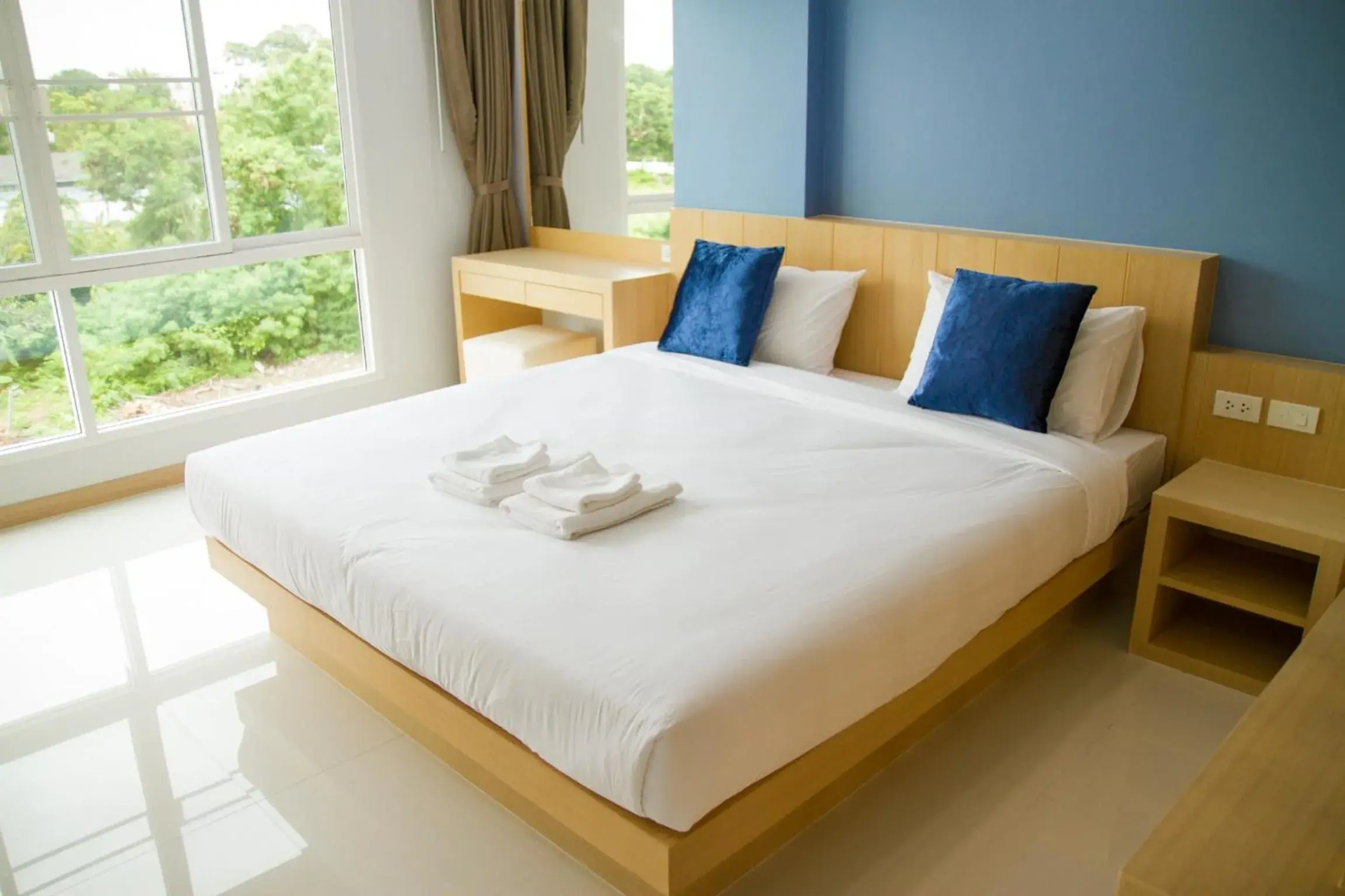 Bed in Charisma Residence