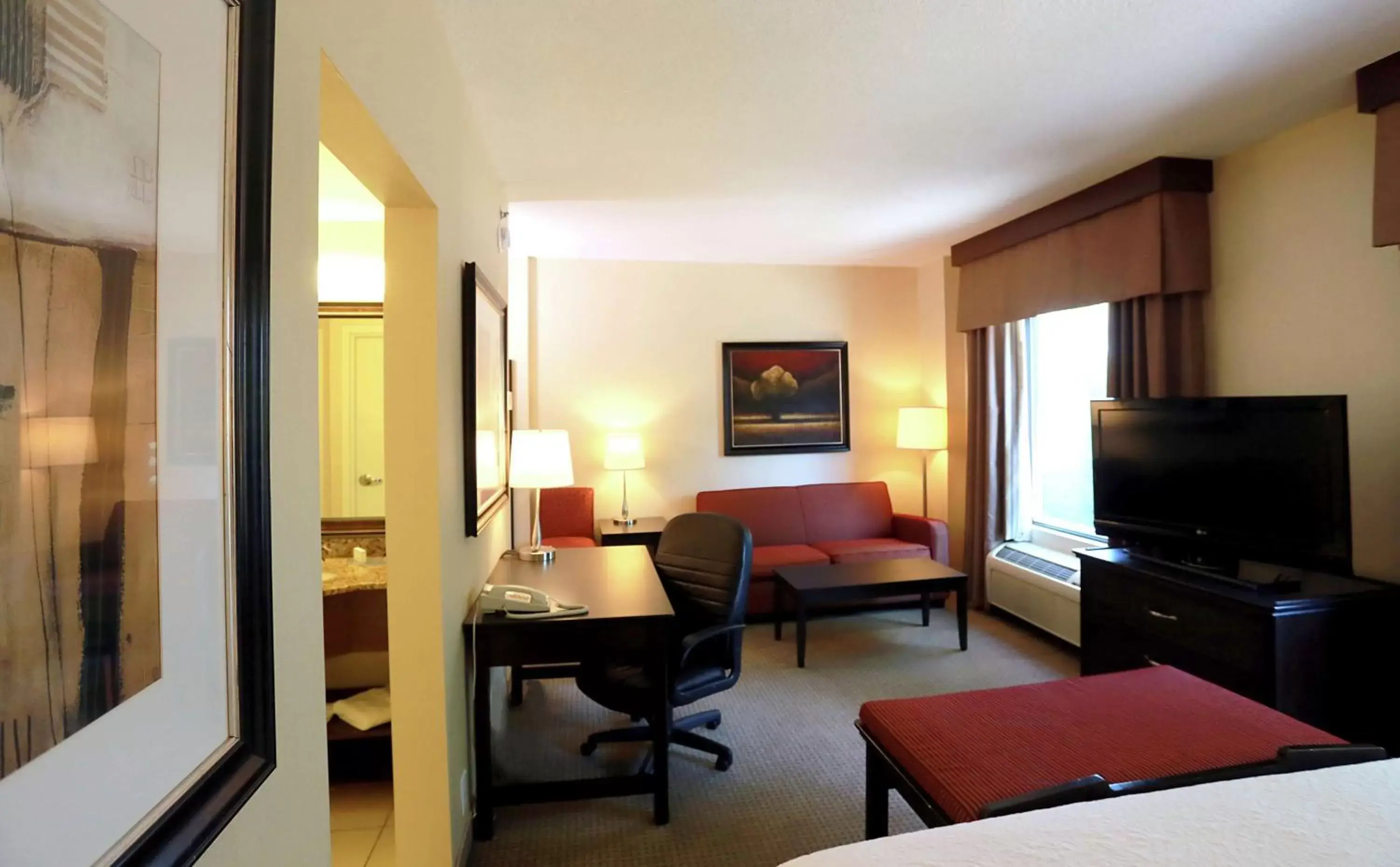 Bedroom, Seating Area in Hampton Inn & Suites Laval