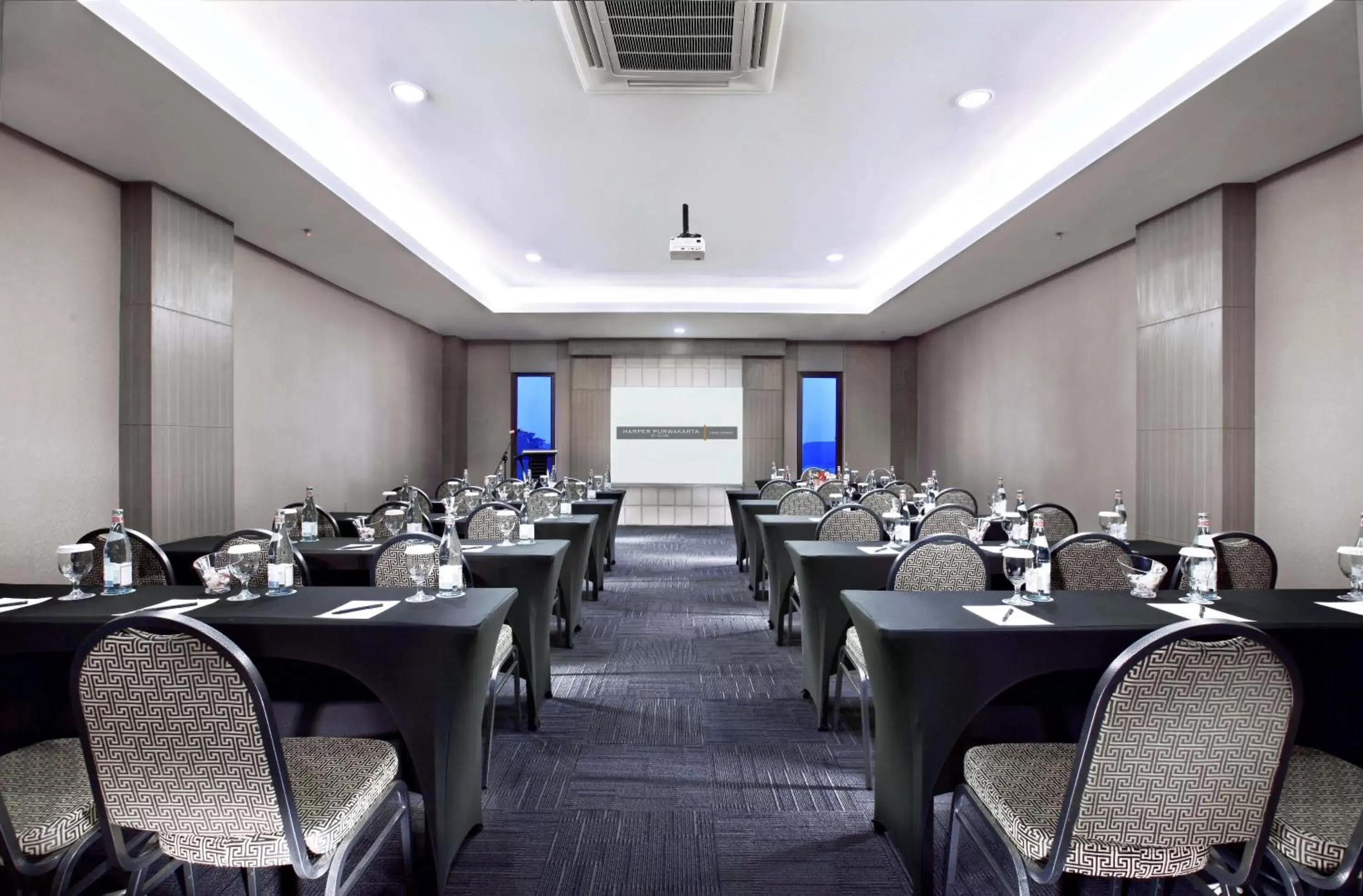 Meeting/conference room in Harper Purwakarta by ASTON