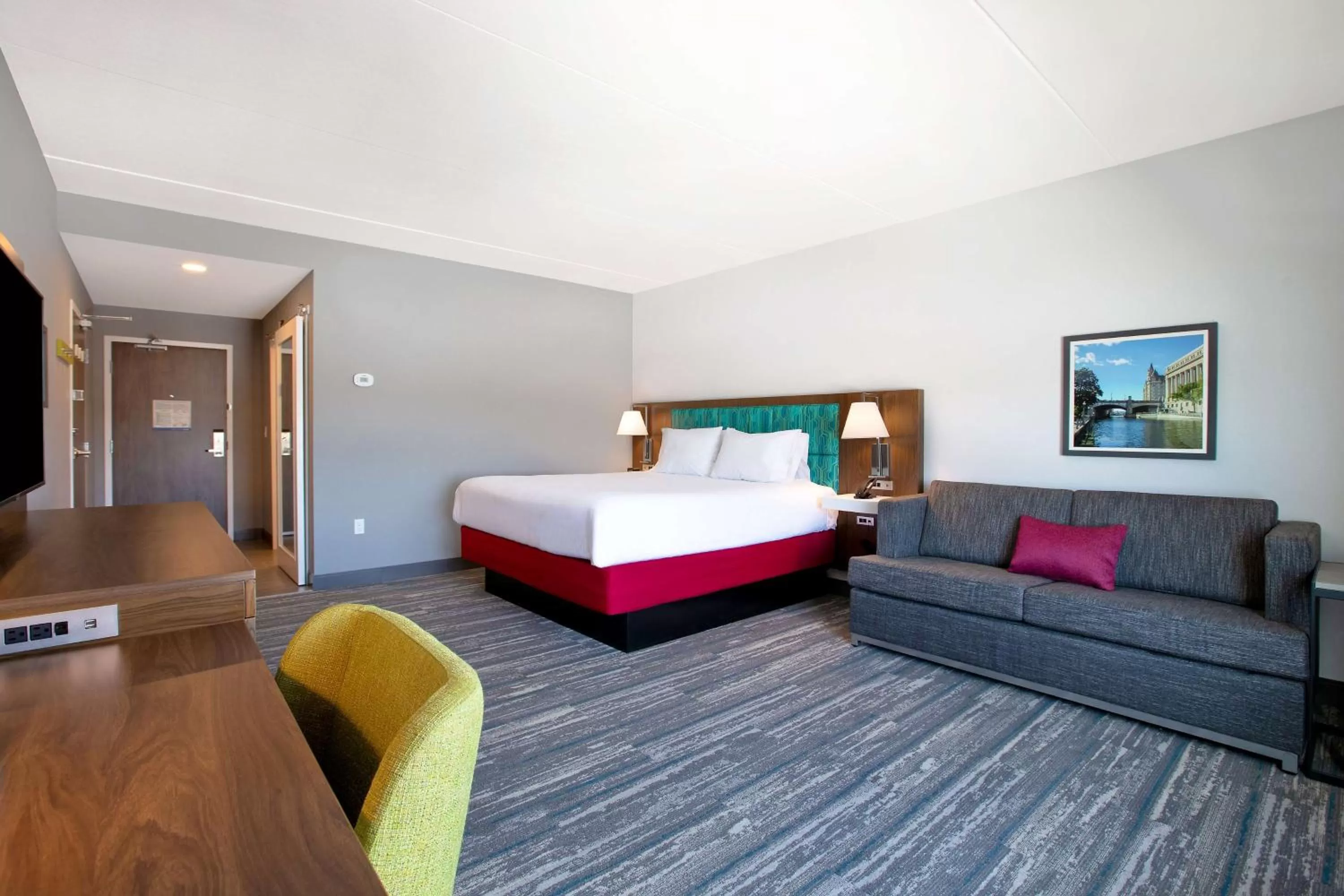 Living room, Bed in Hampton Inn & Suites Ottawa West, Ontario, Canada