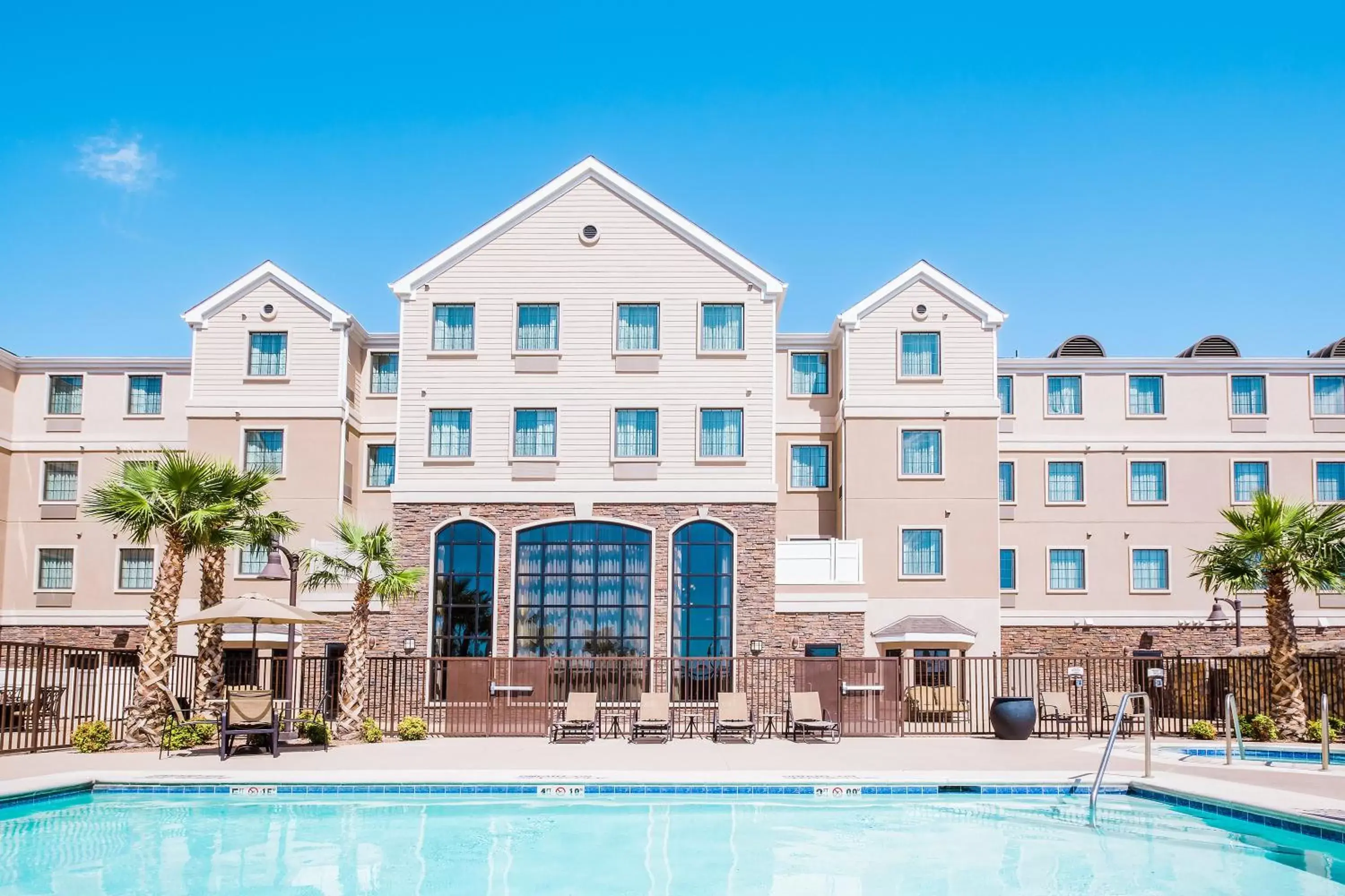 Swimming pool, Property Building in Staybridge Suites El Paso Airport, an IHG Hotel