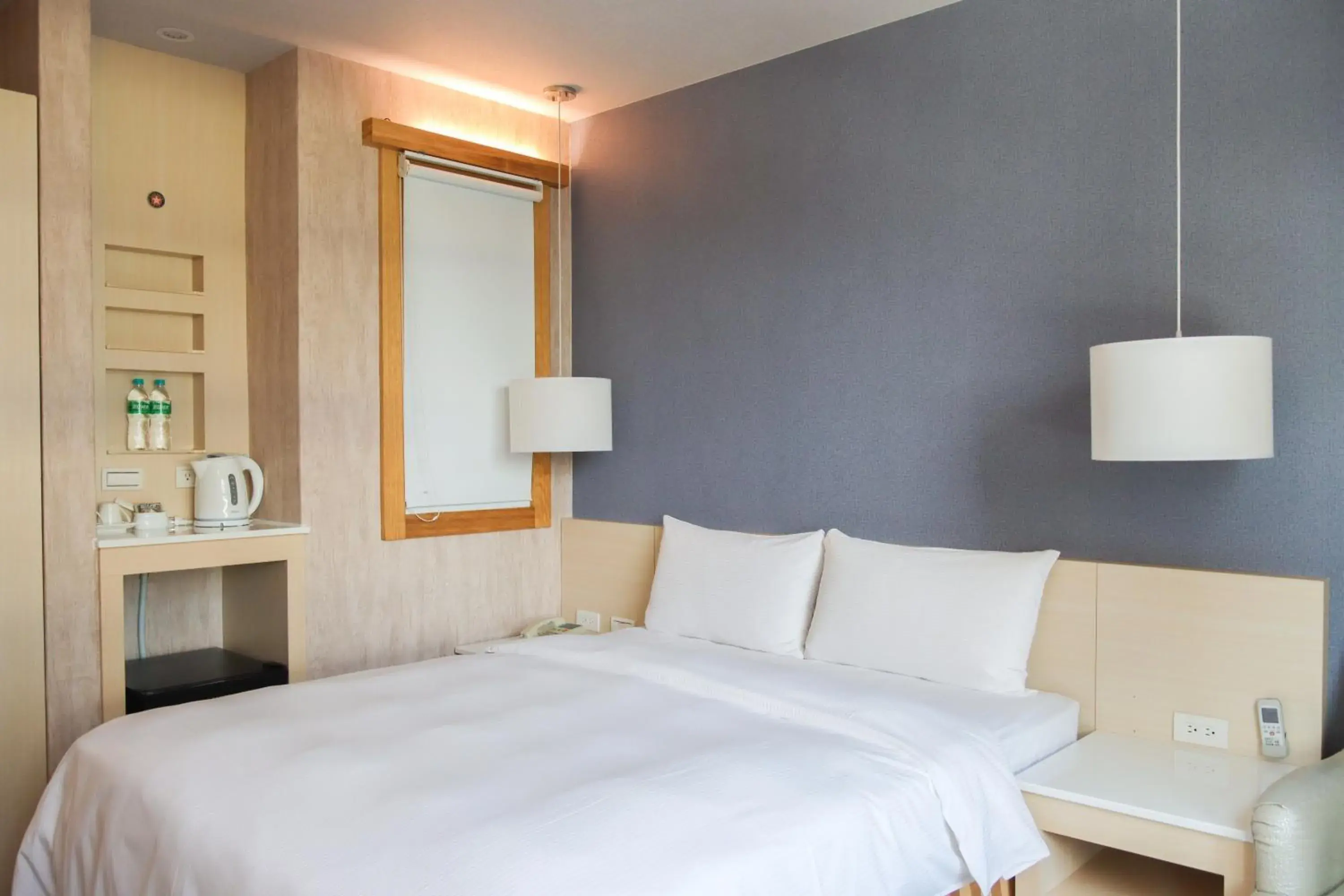 Photo of the whole room, Bed in Kindness Hotel-Kaohsiung Guang Rong Pier