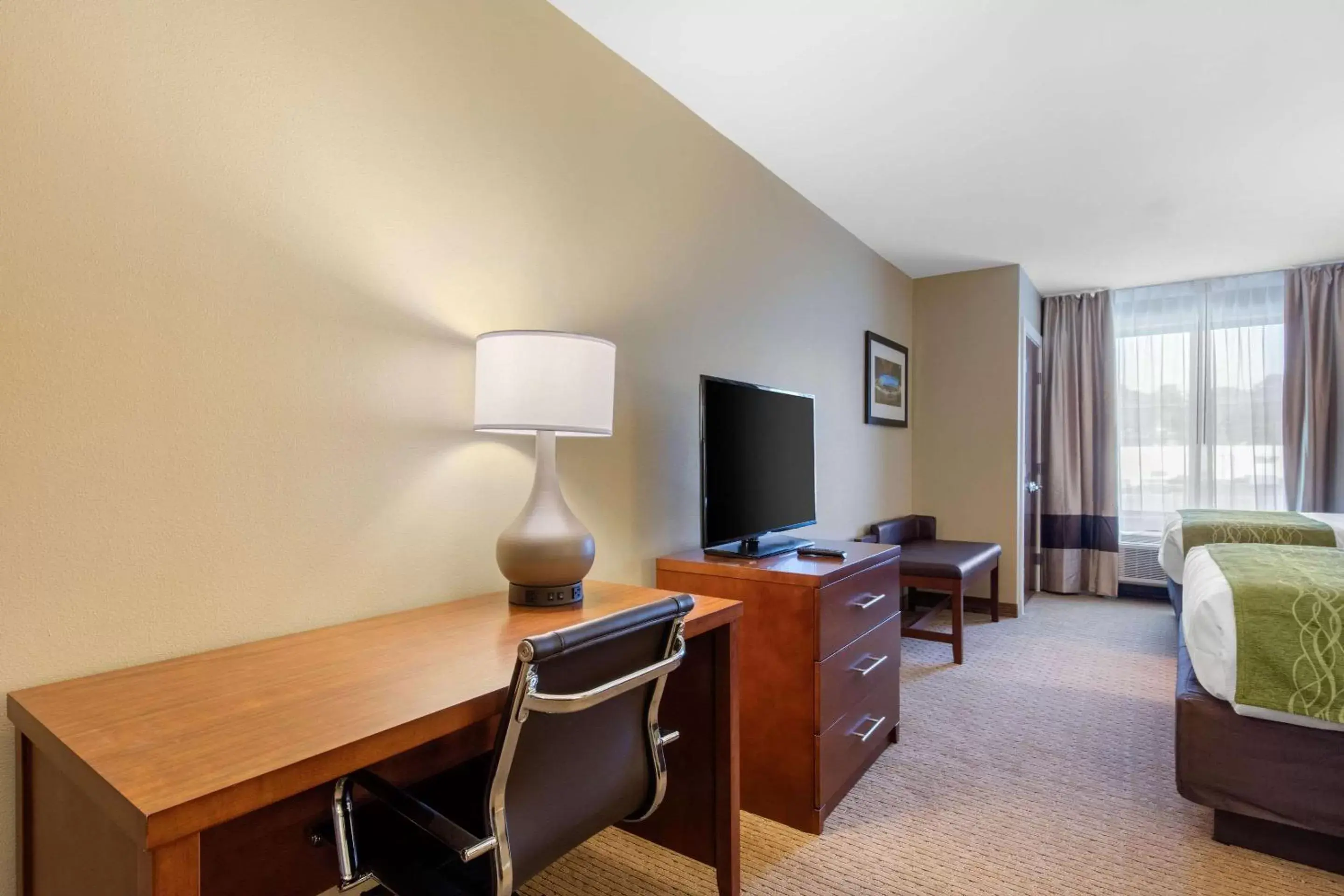 Photo of the whole room, TV/Entertainment Center in Comfort Inn & Suites at CrossPlex Village