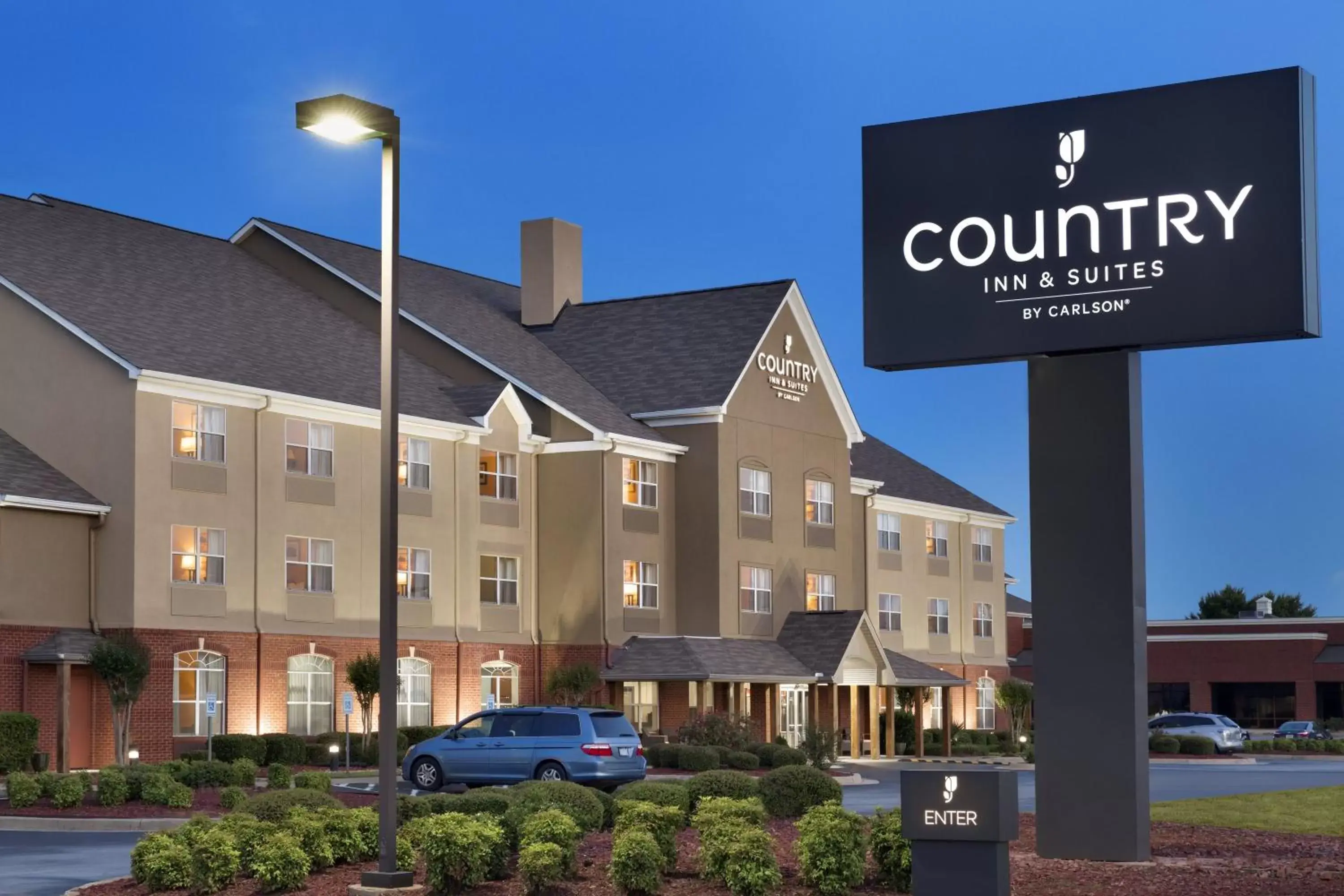 Facade/entrance, Property Building in Country Inn & Suites by Radisson, Warner Robins, GA
