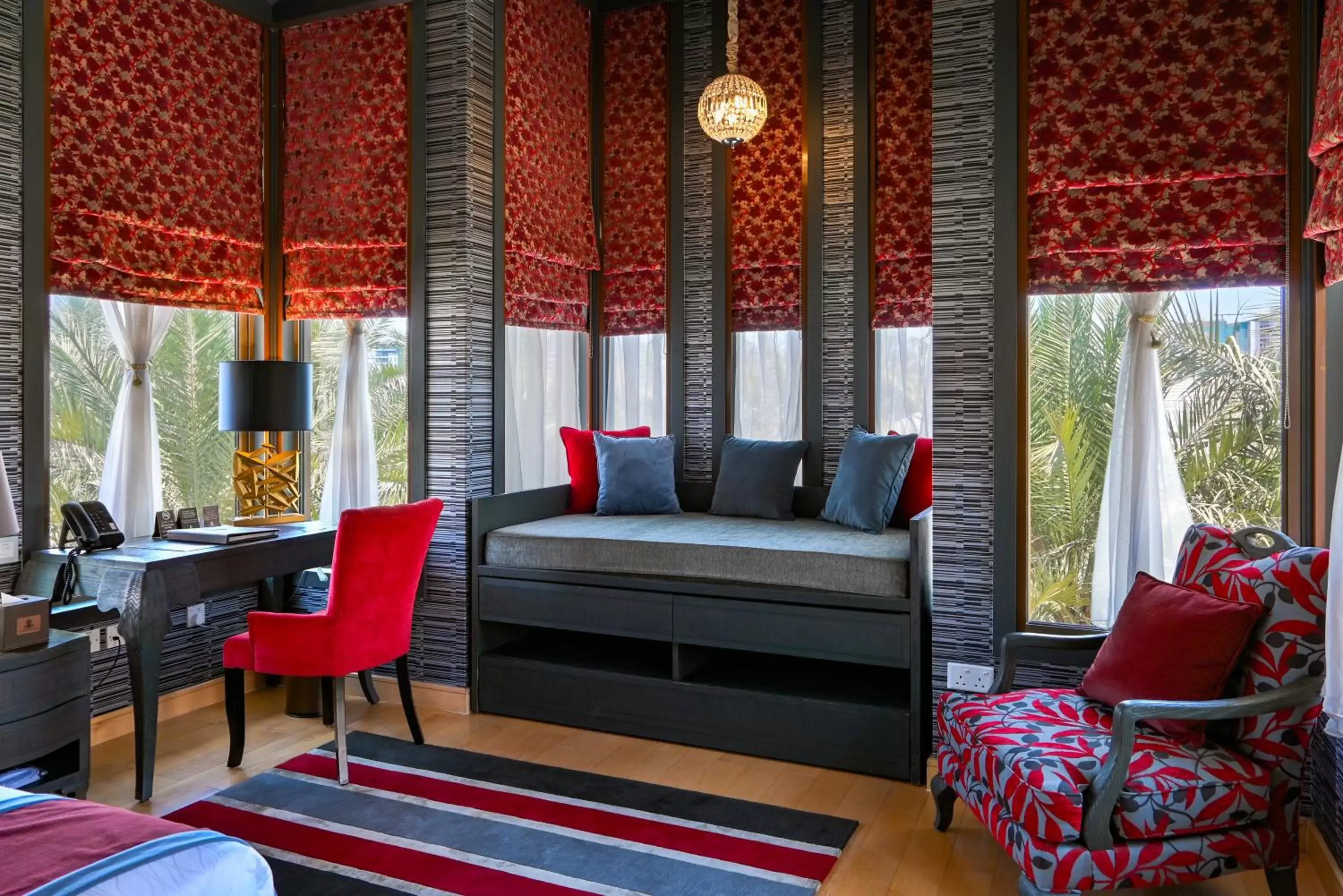 Bed, Seating Area in Reef Boutique Hotel