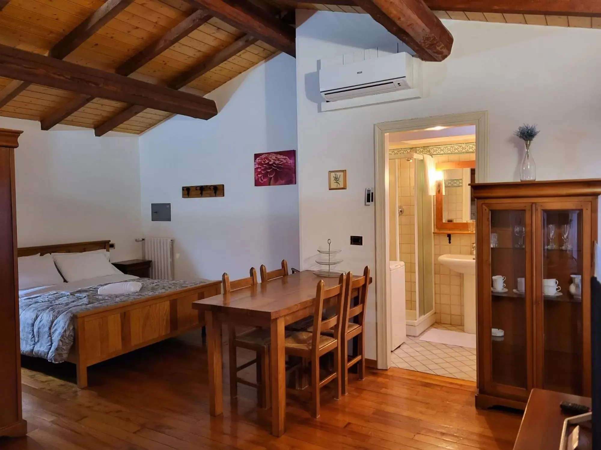 Bed, Dining Area in Residence Antico Borgo