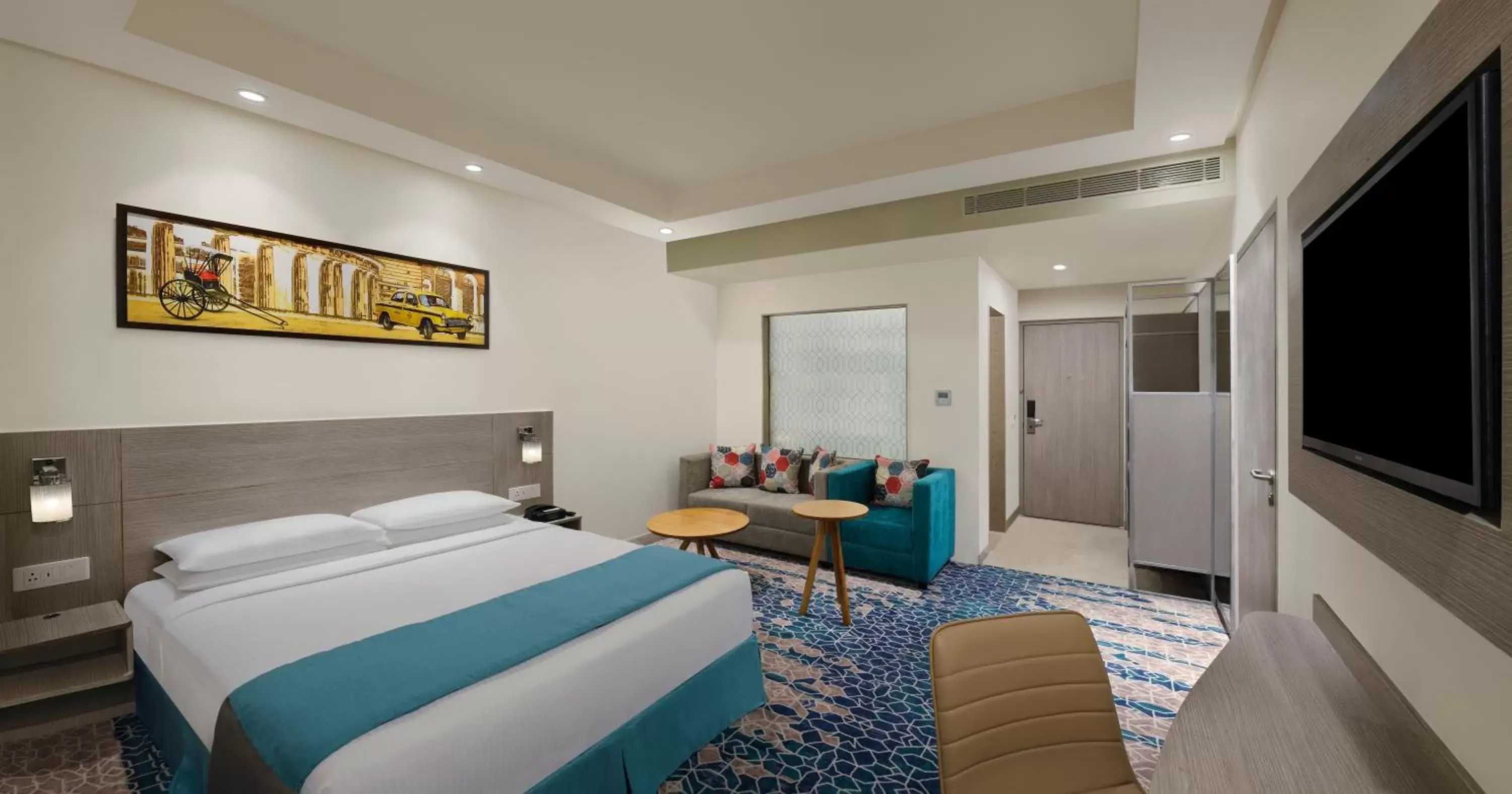 Bedroom in Holiday Inn Express Kolkata Airport, an IHG Hotel