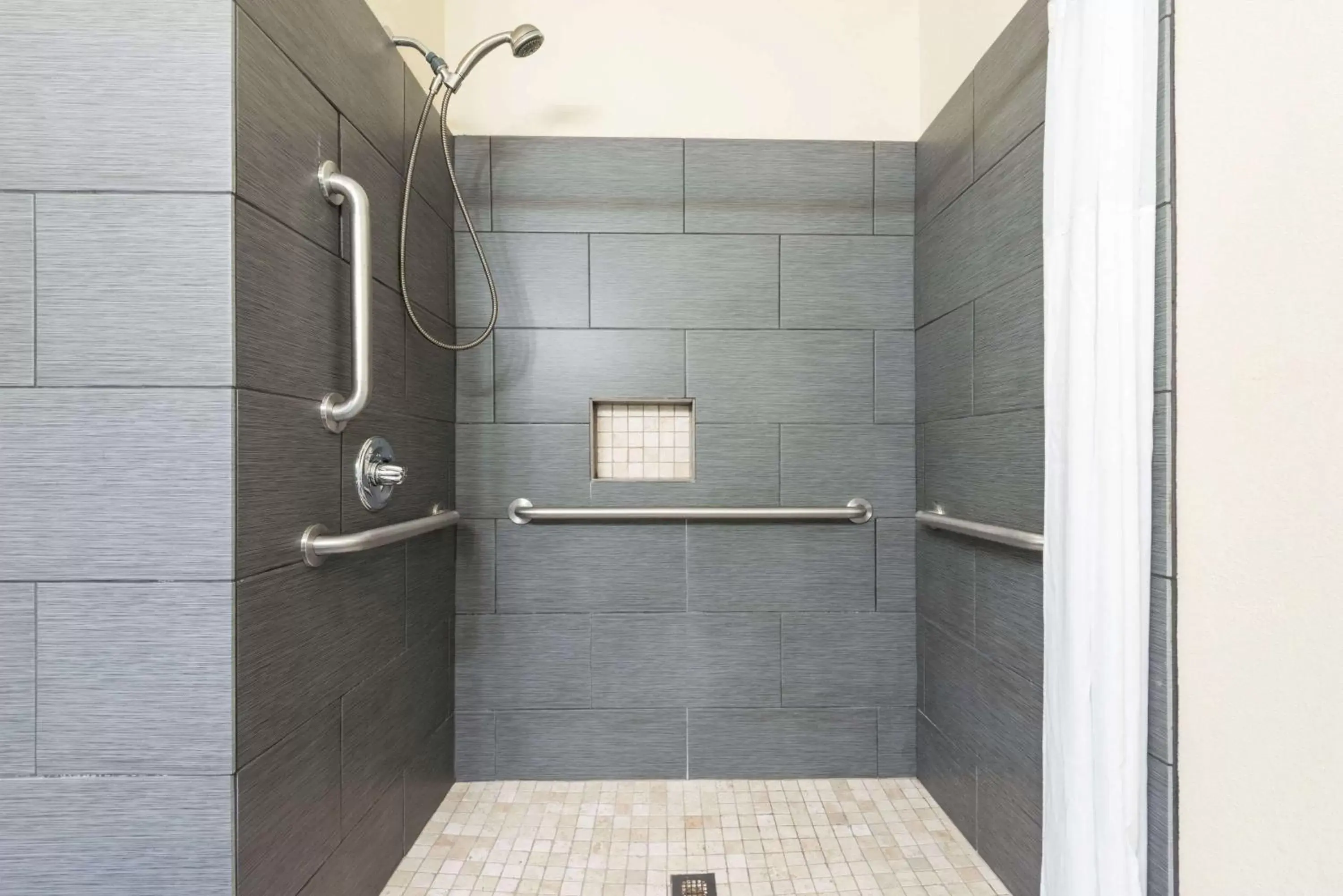 Bathroom in Days Inn & Suites by Wyndham Prattville-Montgomery