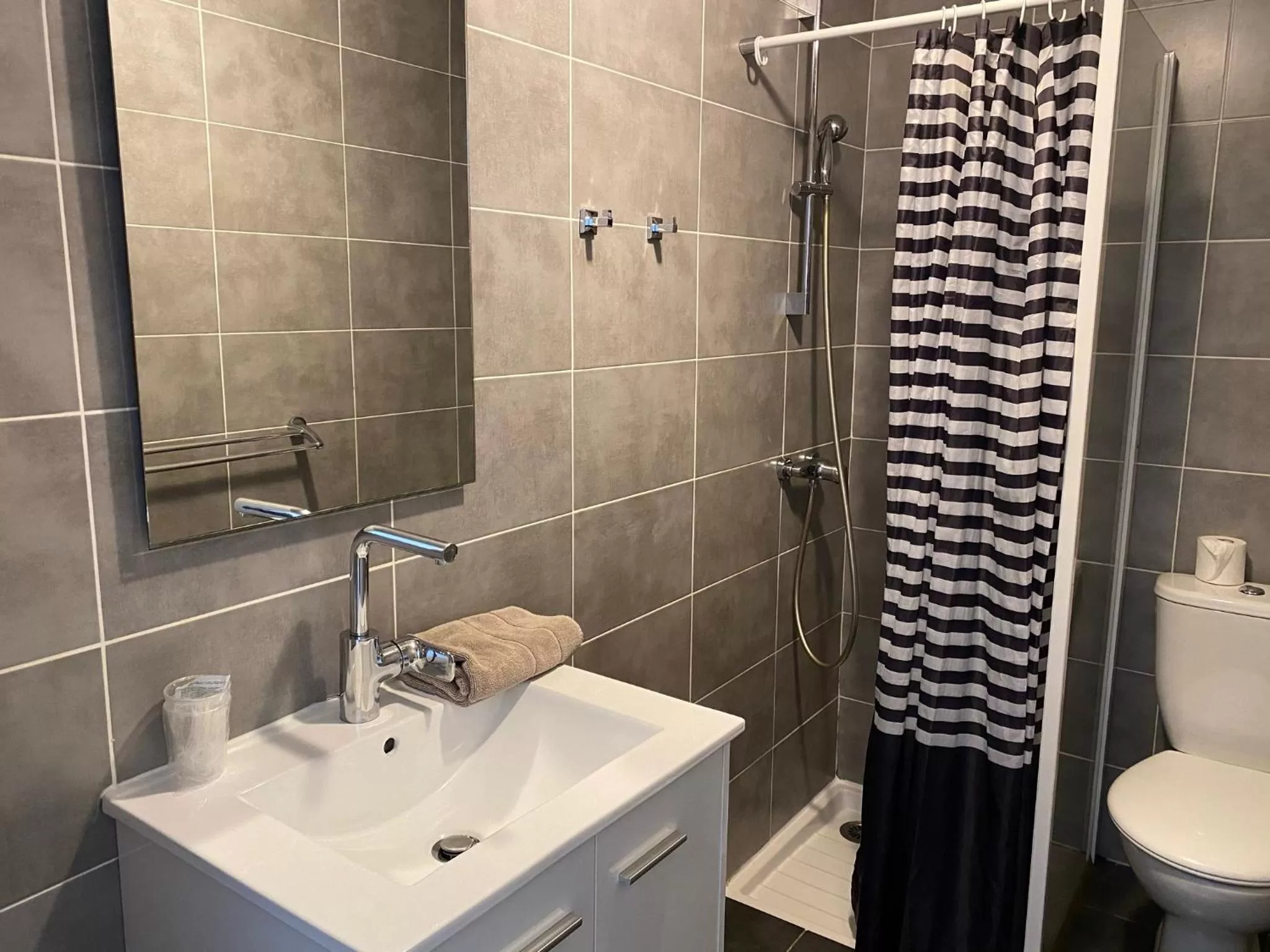 Property building, Bathroom in Hôtel Restaurant Le Provençal