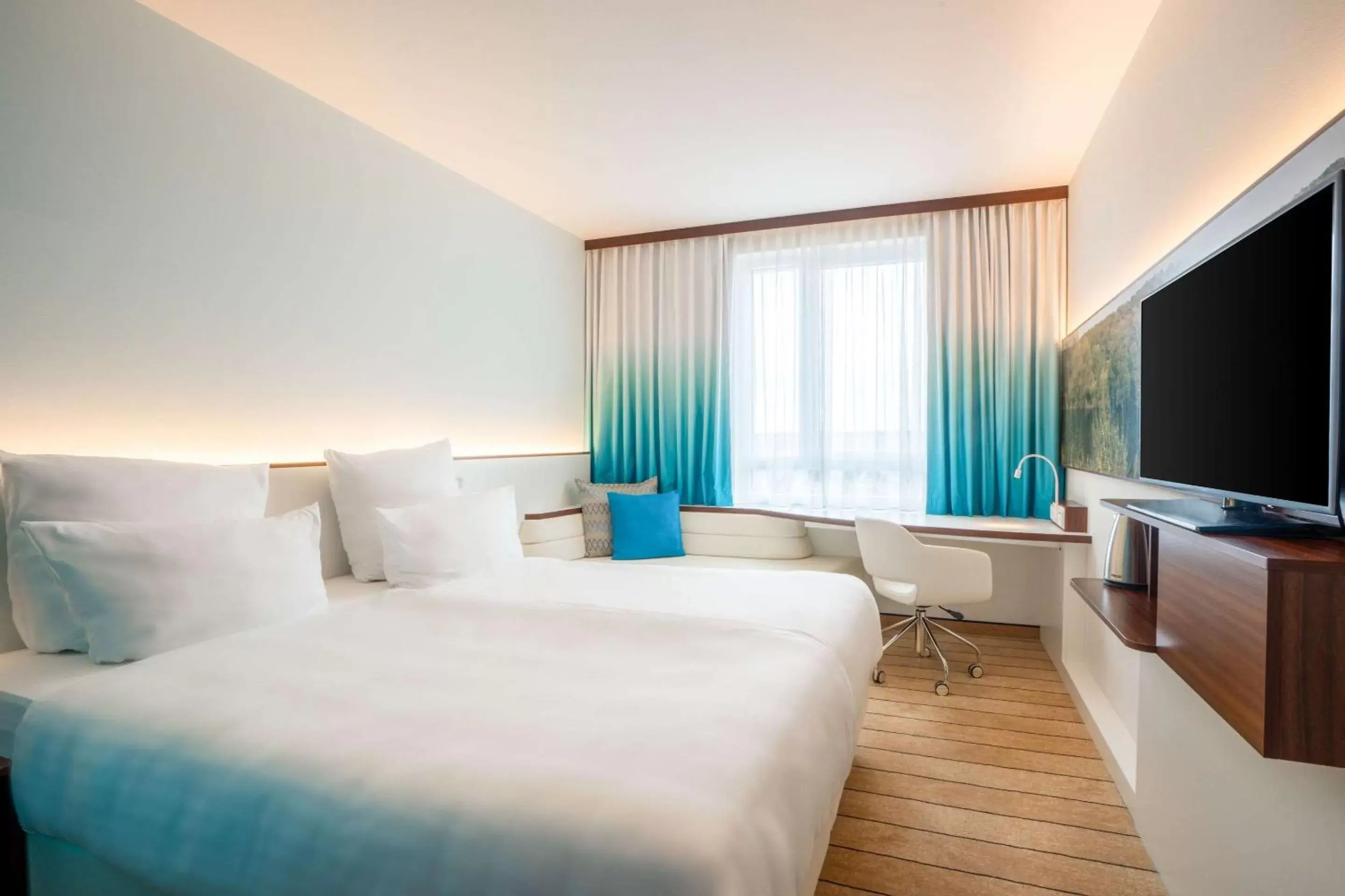 Photo of the whole room, Bed in Styles Hotel Frankfurt Airport