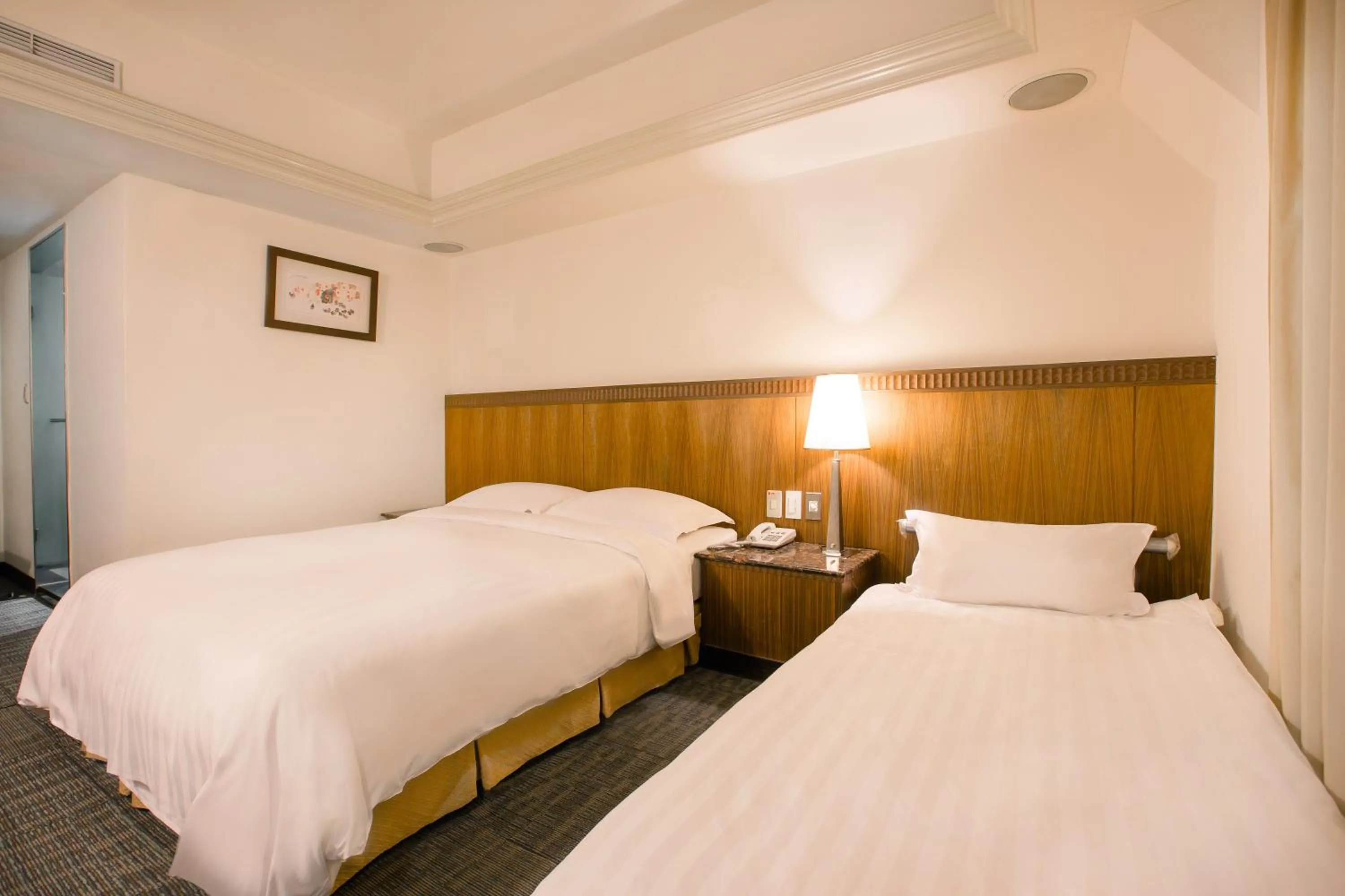 Bed in Hub Hotel Ximen-inn Kunming