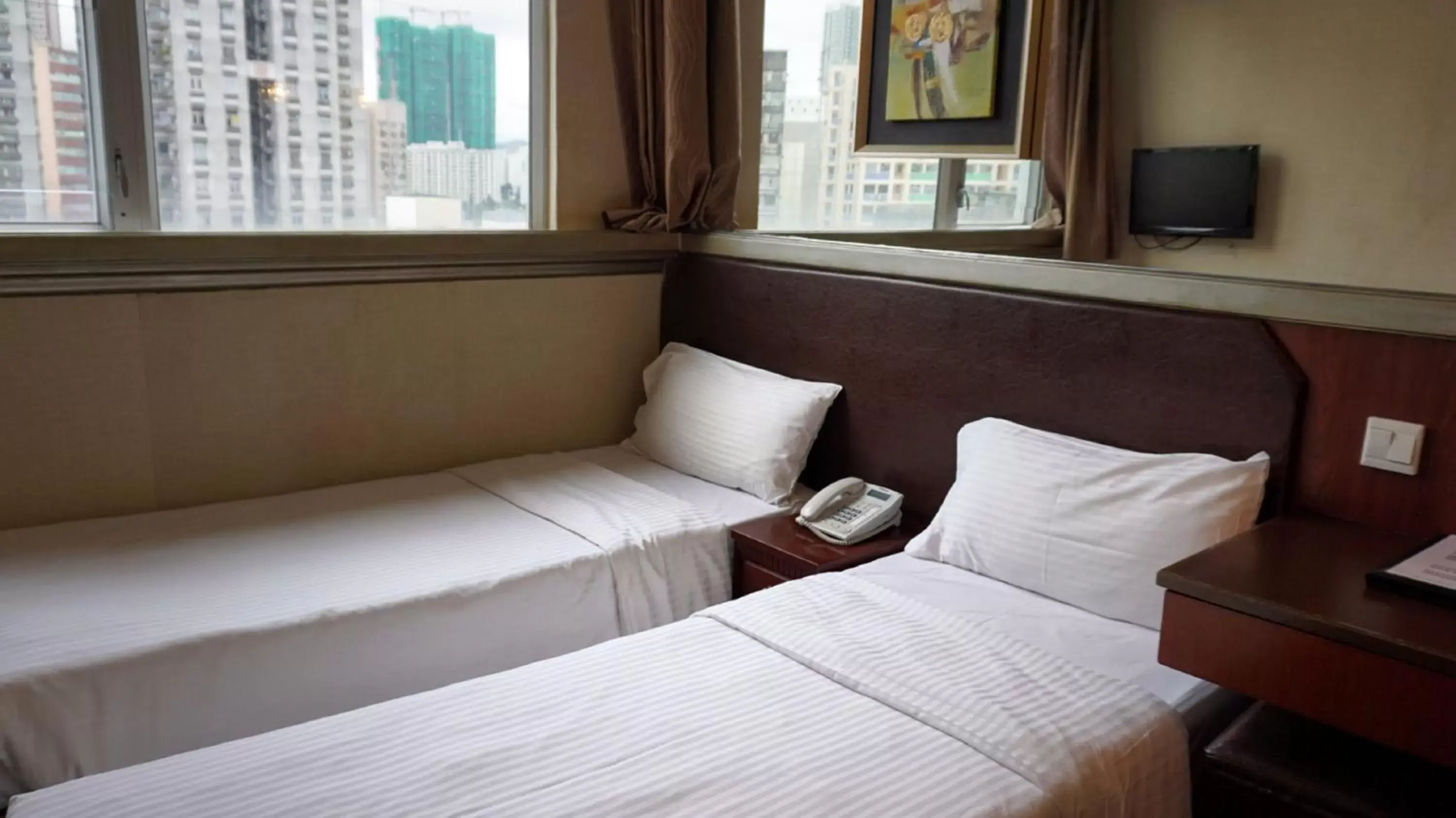 Bed in Oriental Lander Hotel
