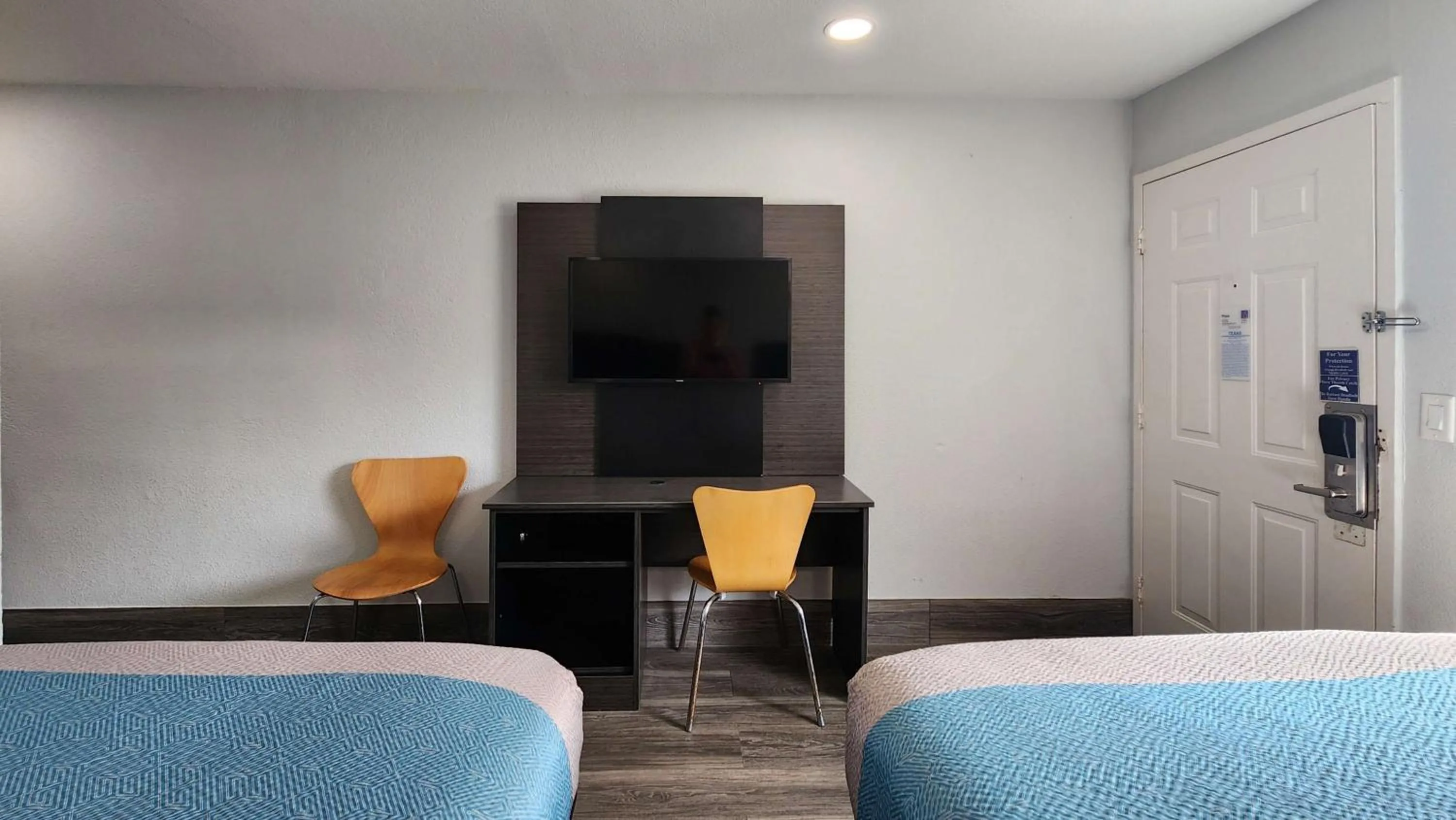 Bed in Motel 6-Galveston, TX