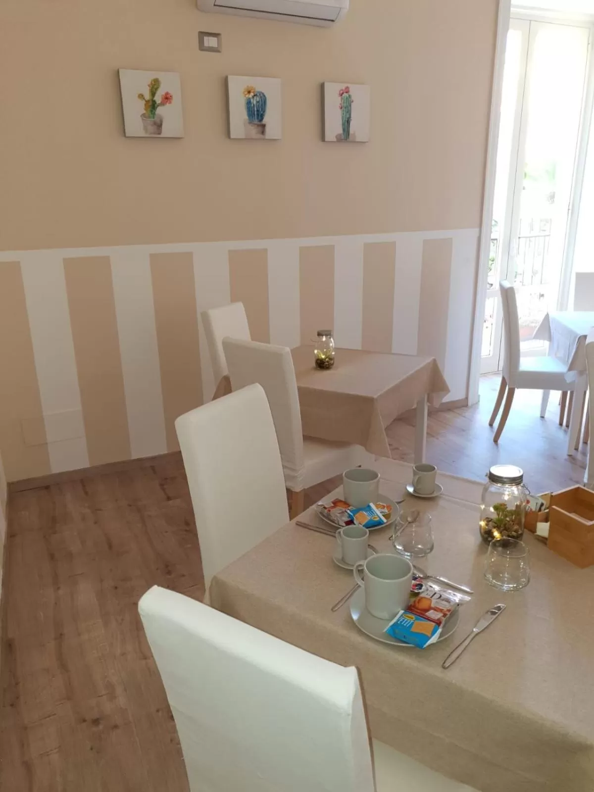 Communal lounge/ TV room in B&B Matteo Bonello