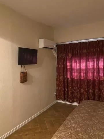 Bedroom in Capri Beach Hotel