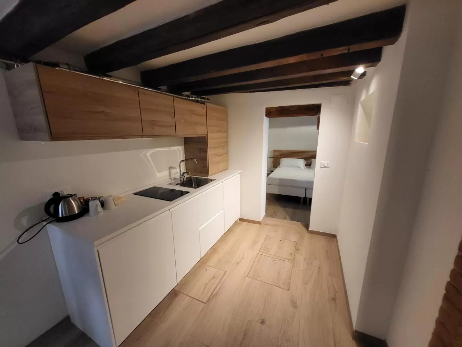 Kitchen or kitchenette, Bed in Hotel Ca' dei Conti