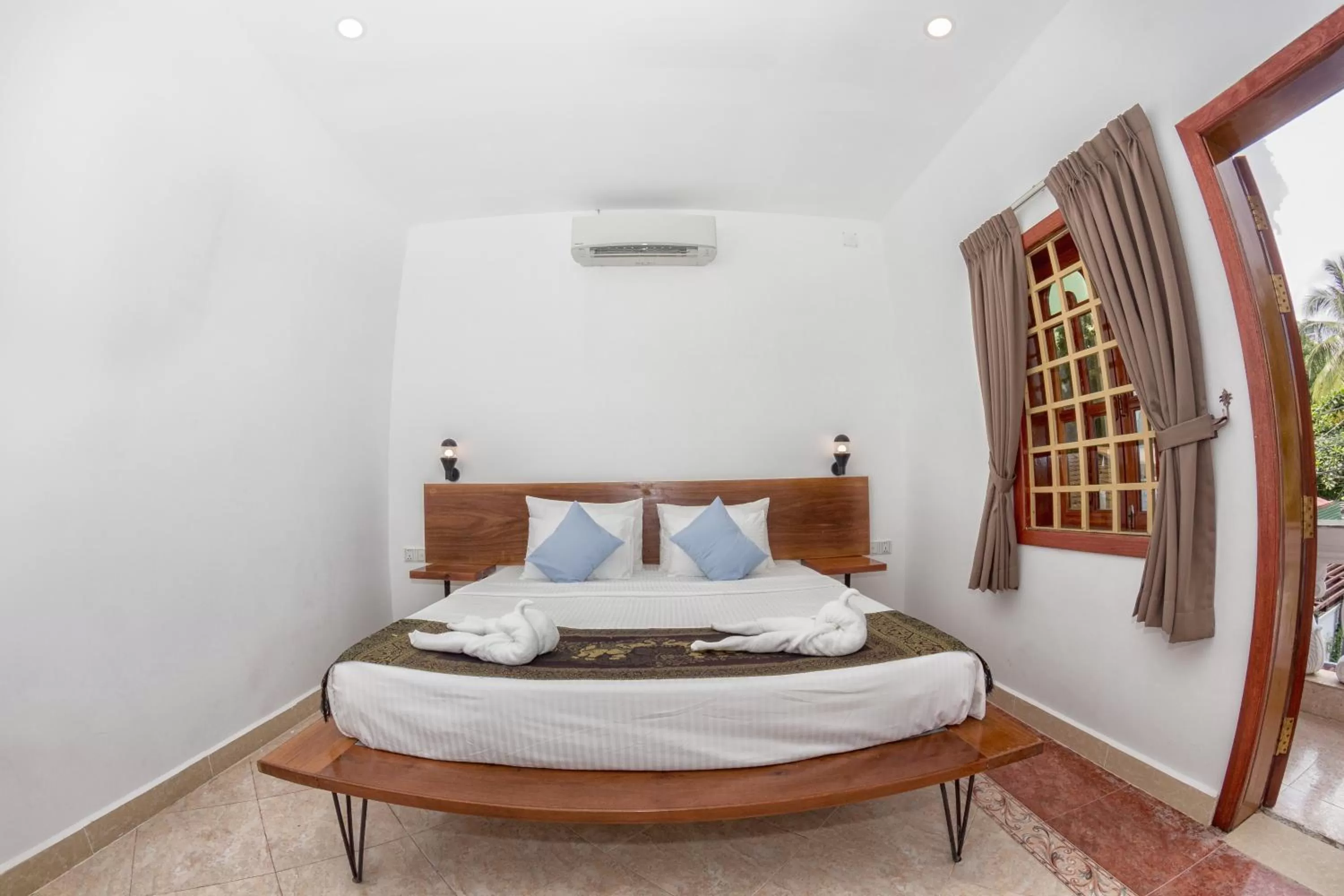 Bed in Poolside Villa