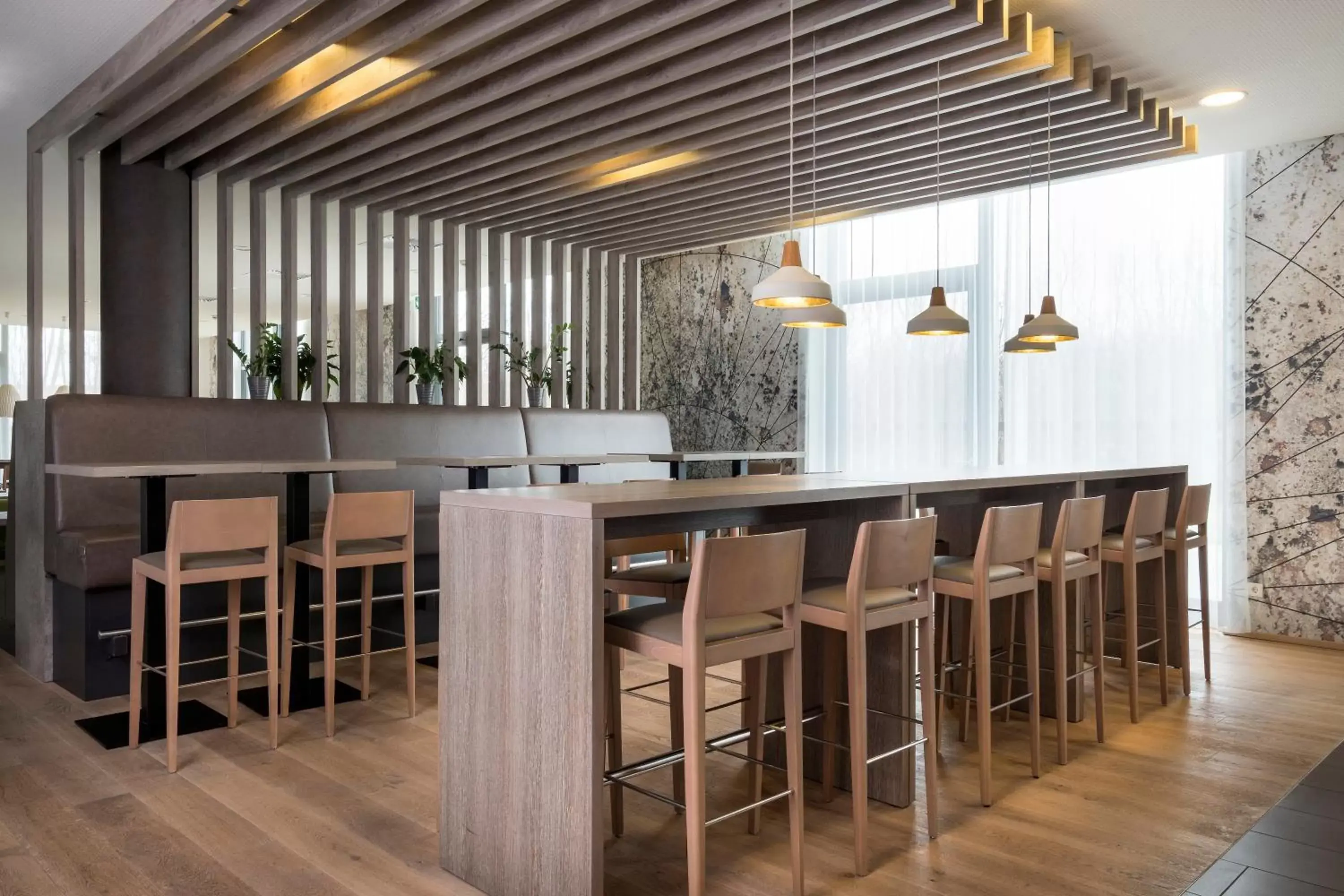 Lounge or bar in Holiday Inn Express Friedrichshafen by IHG Lounge or bar in Holiday Inn Express Friedrichshafen by IHG