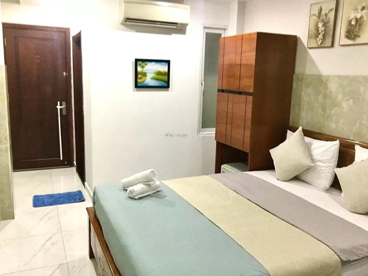 Bed in SaiGon CoZy Hotel "241 Pham Ngu Lao Street'' Bed in SaiGon CoZy Hotel "241 Pham Ngu Lao Street''