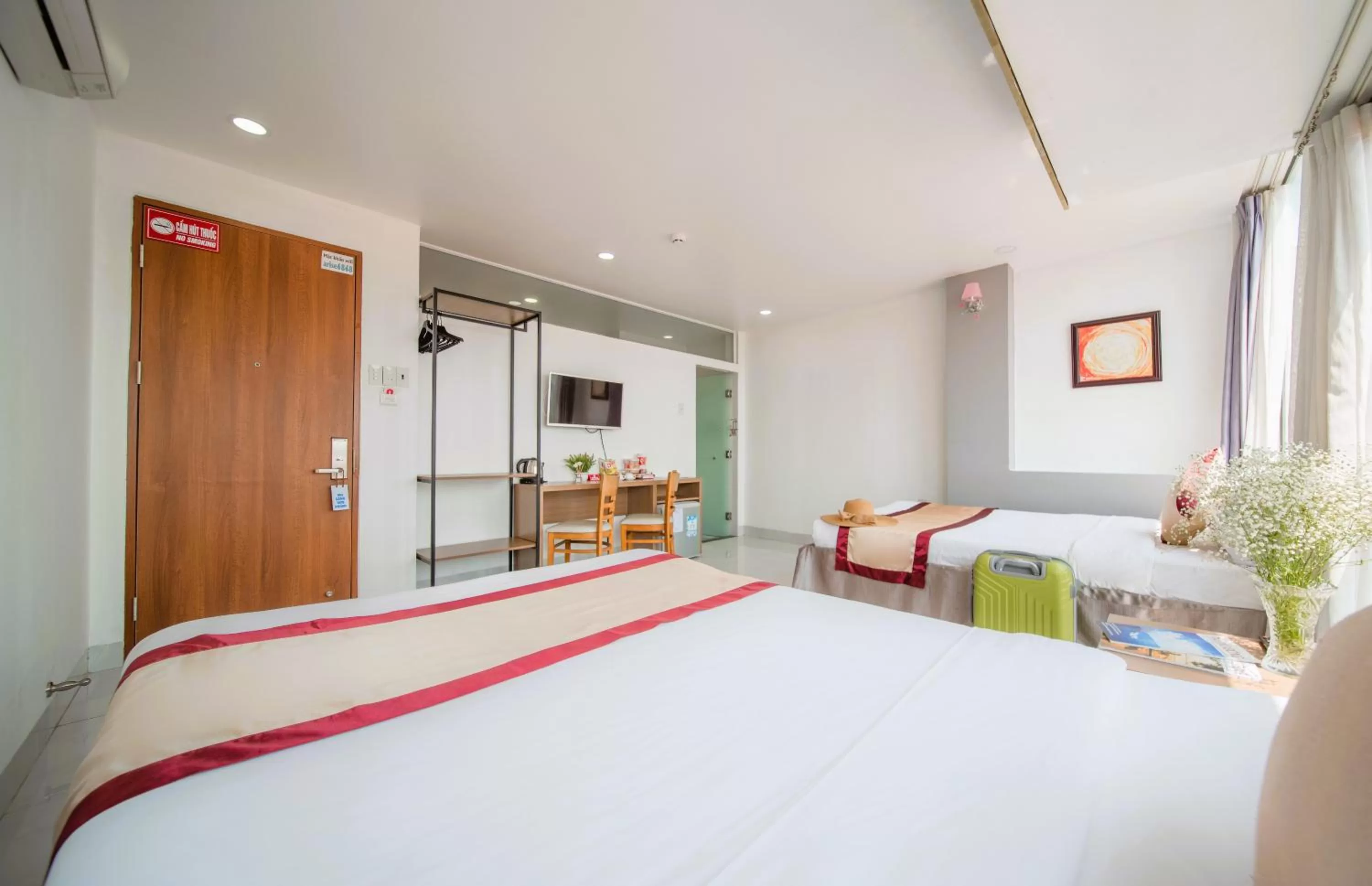 Bed in Arise Seaside Hotel