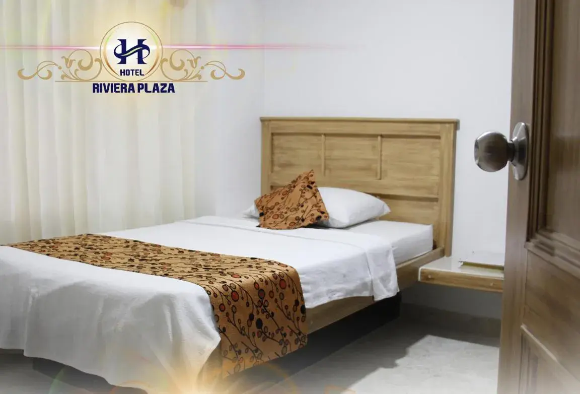 Bed in Hotel Riviera Plaza